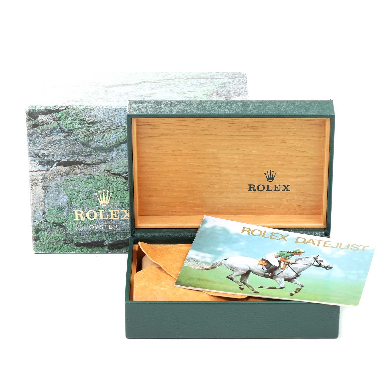 This image shows a Rolex Vintage Collection 16014 Men's Stainless Steel Black Dial 16014 Men's Stainless Steel Black Dial watch box at an angle, with a brochure and cushion accessory inside.