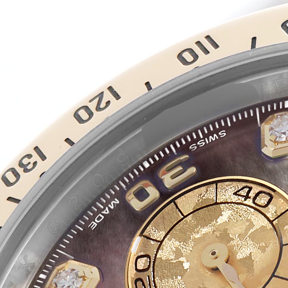 The image shows a close-up of the Rolex Daytona 116523 Men
s Steel and Gold (two tone) Mother of Pearl Dial 116523 Men
s Steel and Gold (two tone) Mother of Pearl Dial
s dial and bezel, highlighting the numbers and part of the subdial.