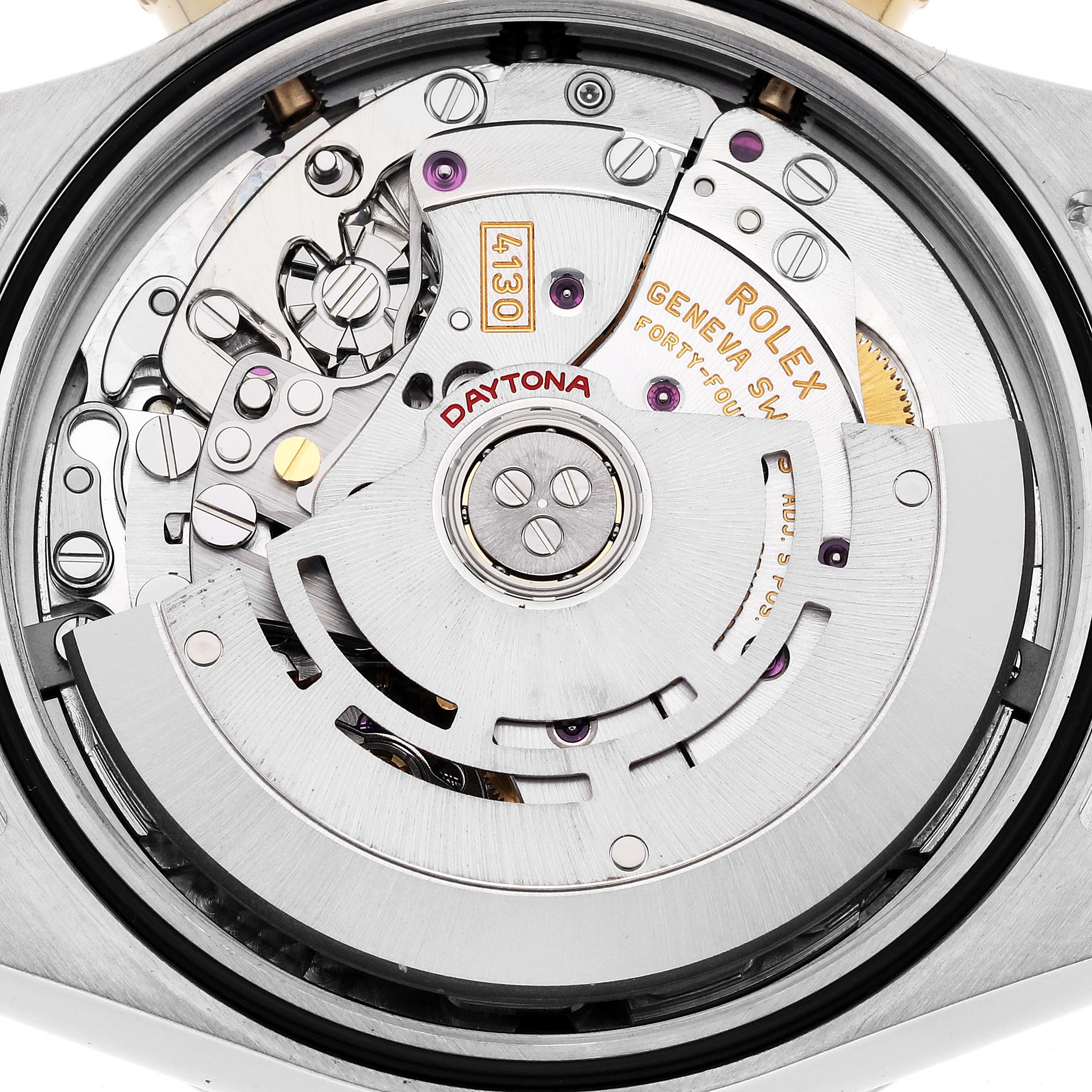 The image shows the Rolex Daytona 116523 Men
s Steel and Gold (two tone) Mother of Pearl Dial 116523 Men
s Steel and Gold (two tone) Mother of Pearl Dial
s movement from the back, highlighting the rotor and intricate internal components.