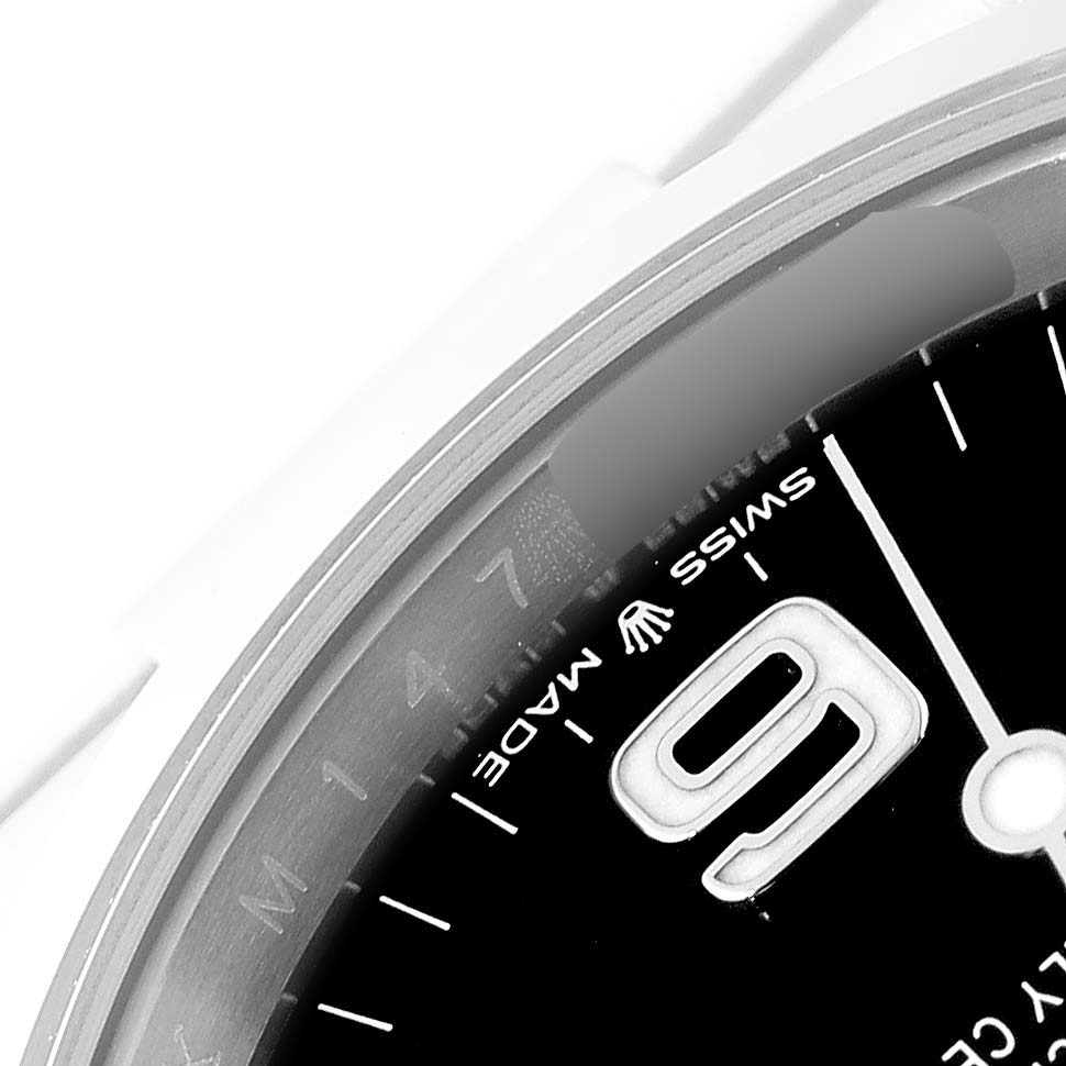 This image shows a close-up of the dial with a partial view of the 3 o
clock marker and "Swiss Made" text on a Rolex Explorer 124270 Men
s Stainless Steel Black Dial 124270 Men
s Stainless Steel Black Dial watch.
