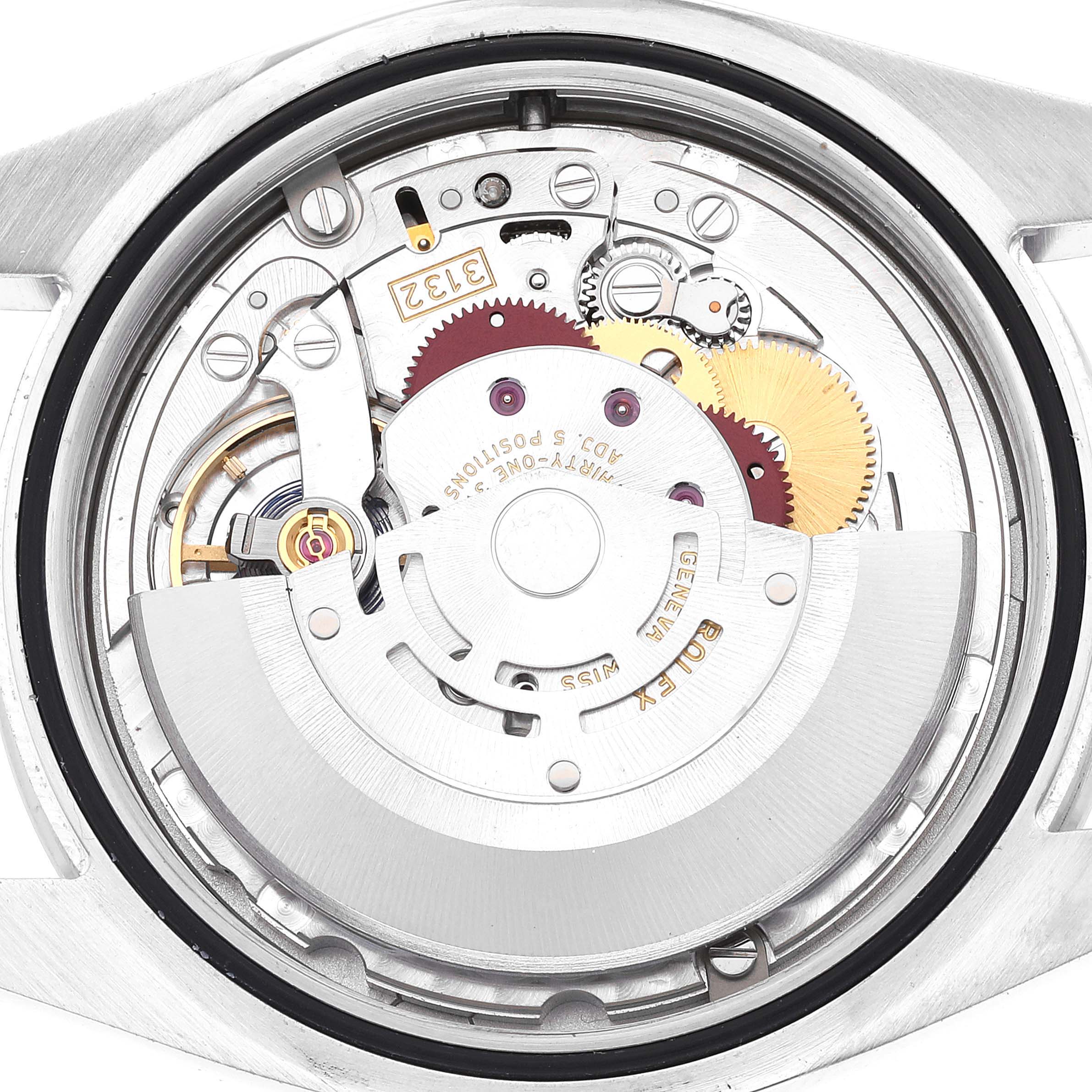 This image shows the internal mechanism and movement parts of a Rolex Explorer 214270 Men
s Stainless Steel Black Dial 214270 Men
s Stainless Steel Black Dial watch from a top-down angle.