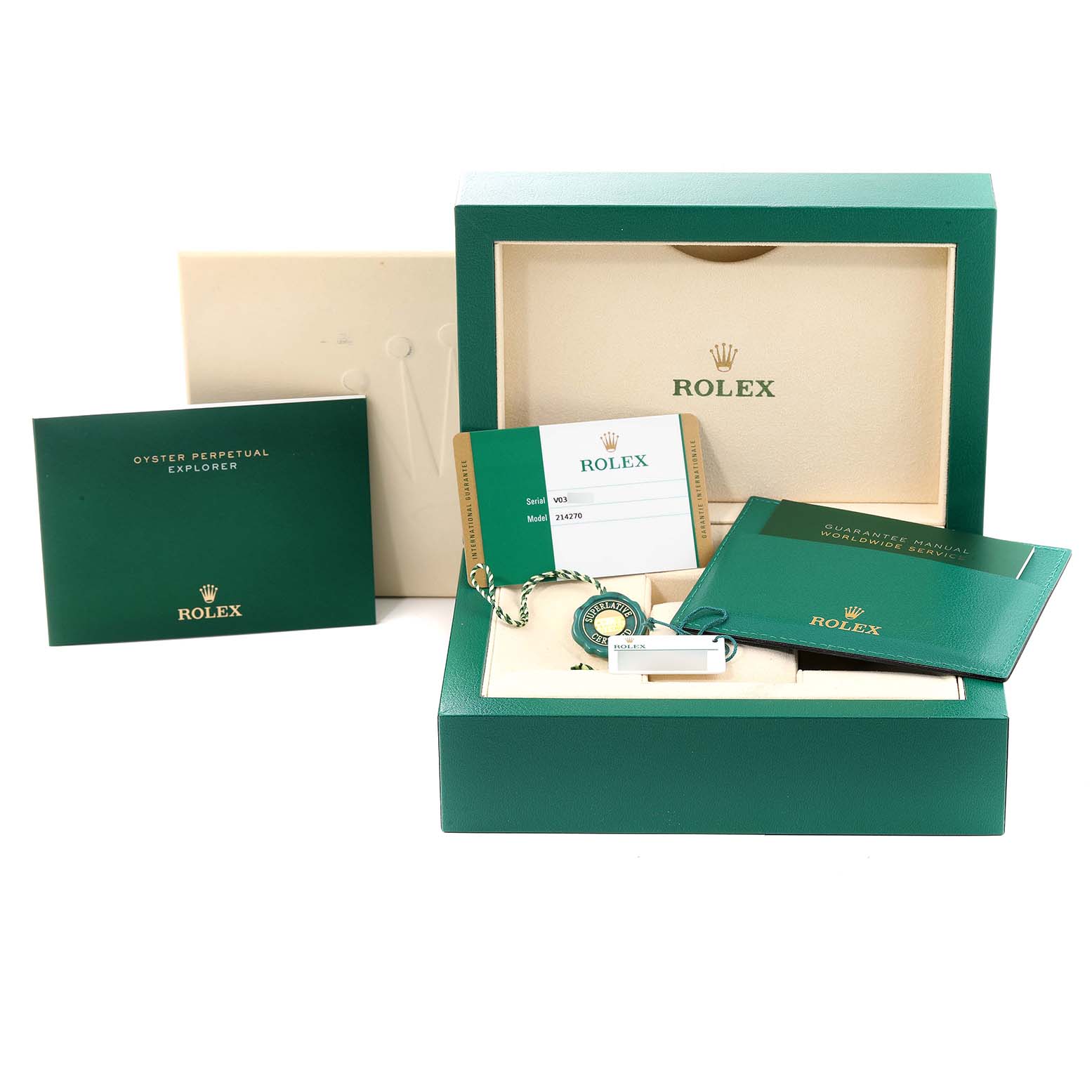 The image shows the packaging, manuals, tags, and warranty card for the Rolex Explorer 214270 Men
s Stainless Steel Black Dial 214270 Men
s Stainless Steel Black Dial model watch.