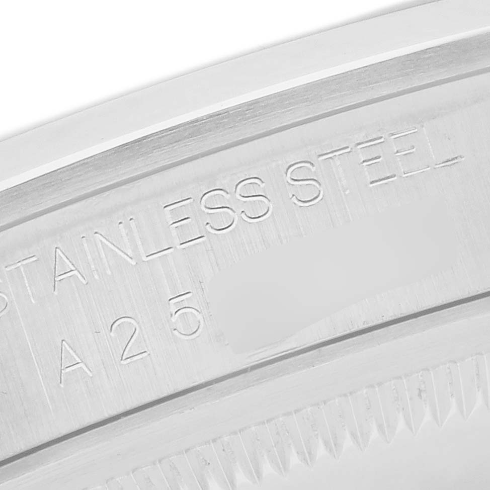 The image shows a close-up of the case back of a Rolex Explorer 14270 Men
s Stainless Steel Black Dial 14270 Men
s Stainless Steel Black Dial, highlighting the stainless steel engraving.