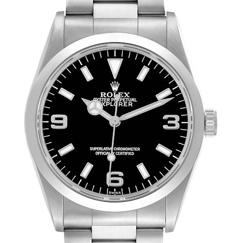 The Rolex Explorer watch is shown from a front angle, highlighting its dial, bezel, crown, and a portion of the bracelet.
