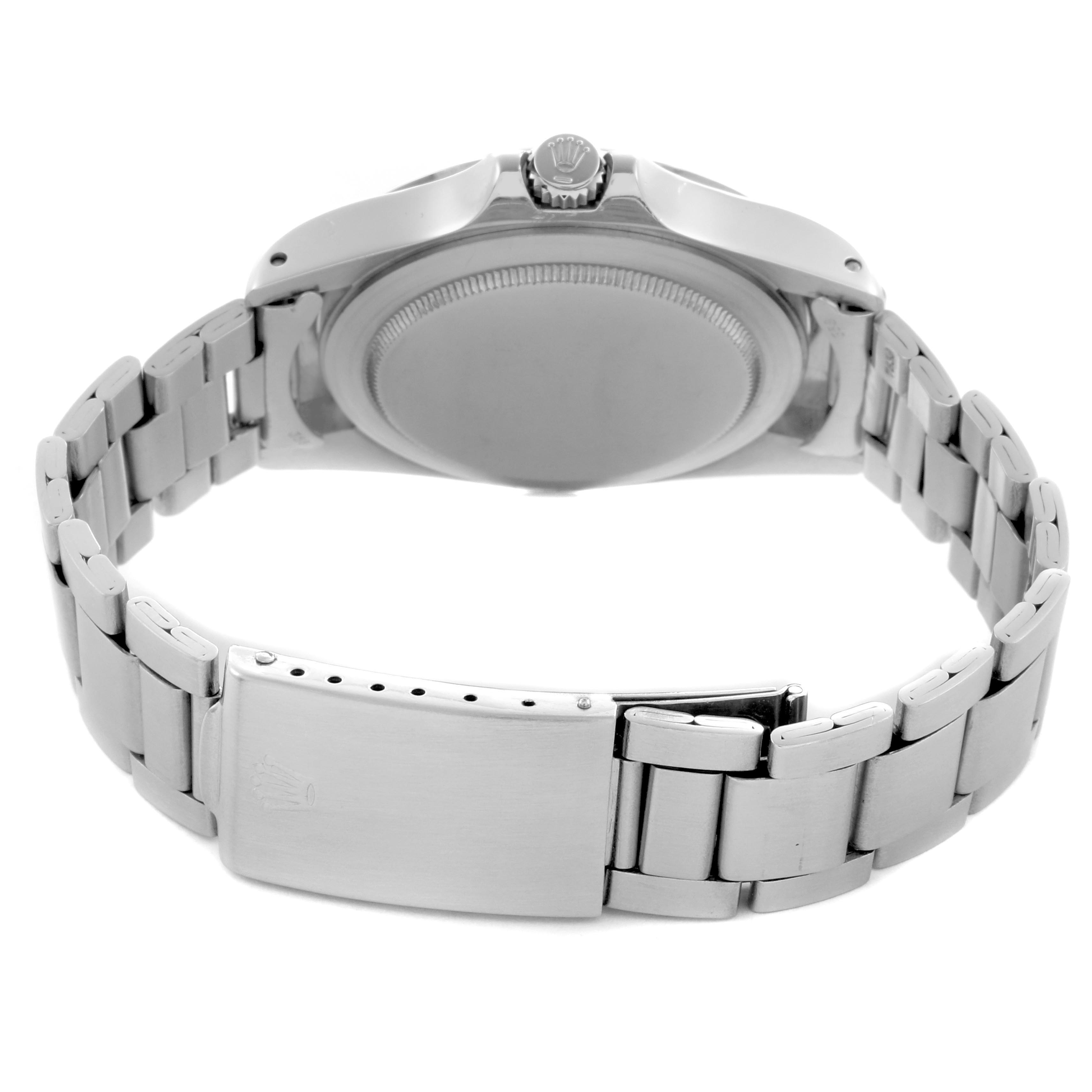 The image shows the back of a Rolex Explorer 1655 Men
s Stainless Steel Black Dial 1655 Men
s Stainless Steel Black Dial watch, highlighting the case back, crown, and bracelet clasp.