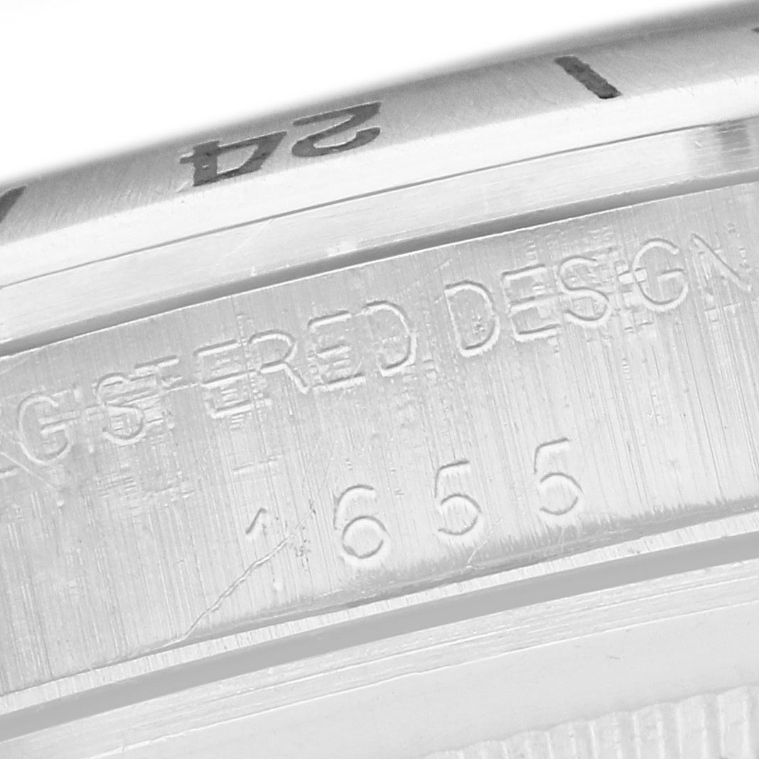 The image shows a close-up of the side engraving on a Rolex Explorer 1655 Men
s Stainless Steel Black Dial 1655 Men
s Stainless Steel Black Dial watch, focusing on the case details.