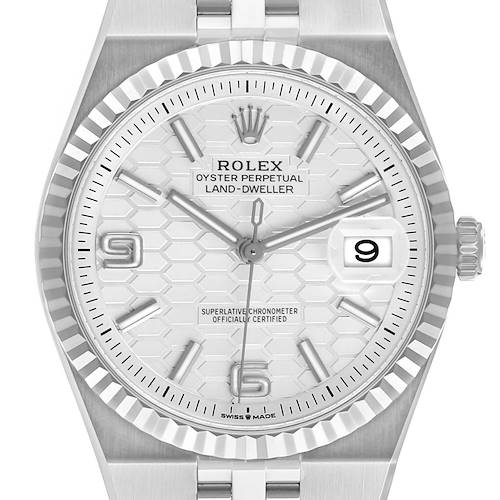 The Rolex Land‑Dweller 127334 Men's Stainless Steel White Dial watch is shown from a front angle, displaying the dial, bezel, crown, and part of the bracelet.