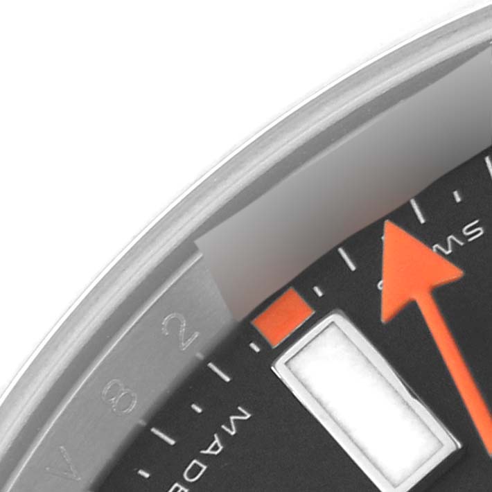 This close-up image shows the dial and part of the bezel on a Rolex Milgauss 116400 Men's Stainless Steel Black Dial 116400 Men's Stainless Steel Black Dial watch.