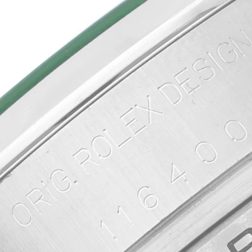 The image shows a close-up of the engraved case back of a Rolex Milgauss 116400 Men's Stainless Steel Blue Dial 116400 Men's Stainless Steel Blue Dial watch.