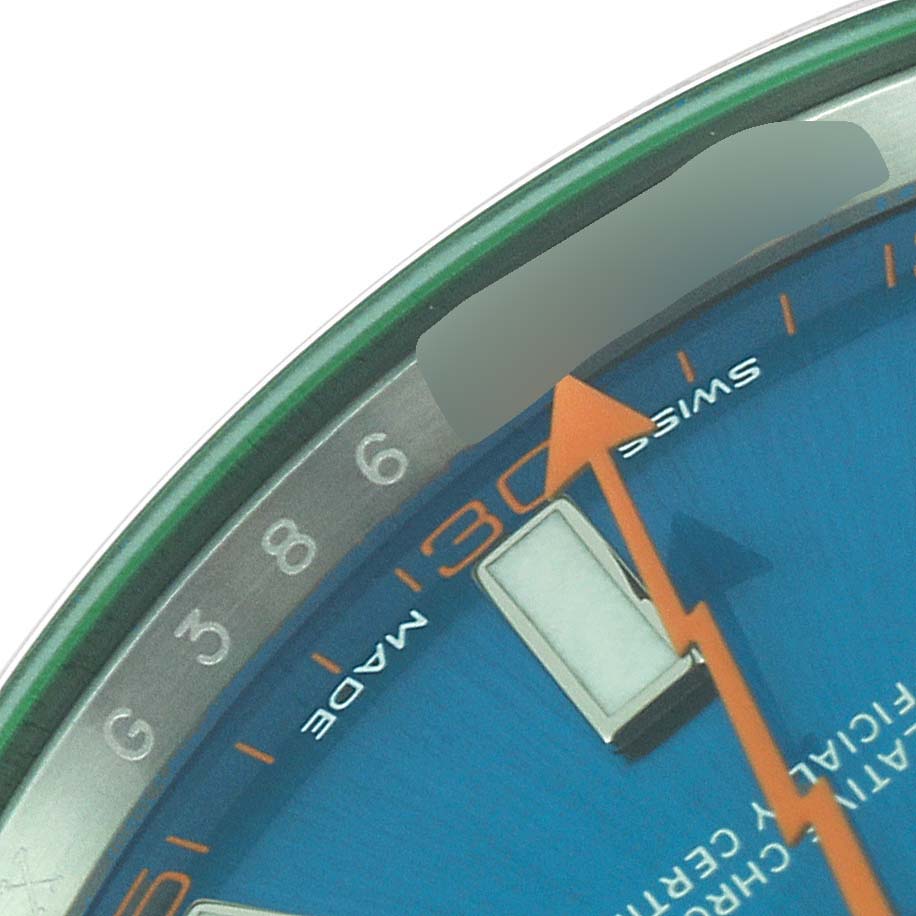 The image shows a close-up of the dial and partial bezel of a Rolex Milgauss 116400 Men
s Stainless Steel Blue Dial 116400 Men
s Stainless Steel Blue Dial watch, highlighting the orange lightning-bolt second hand and blue face.