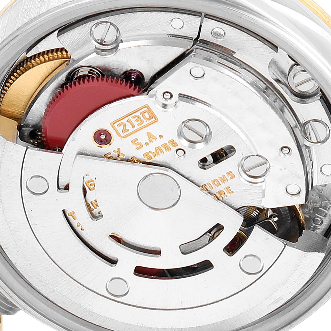 This image shows a close-up view of the movement and internal mechanism of the Rolex Oyster Perpetual 67193 Women
s Steel and Gold (two tone) Champagne Dial 67193 Women
s Steel and Gold (two tone) Champagne Dial watch.