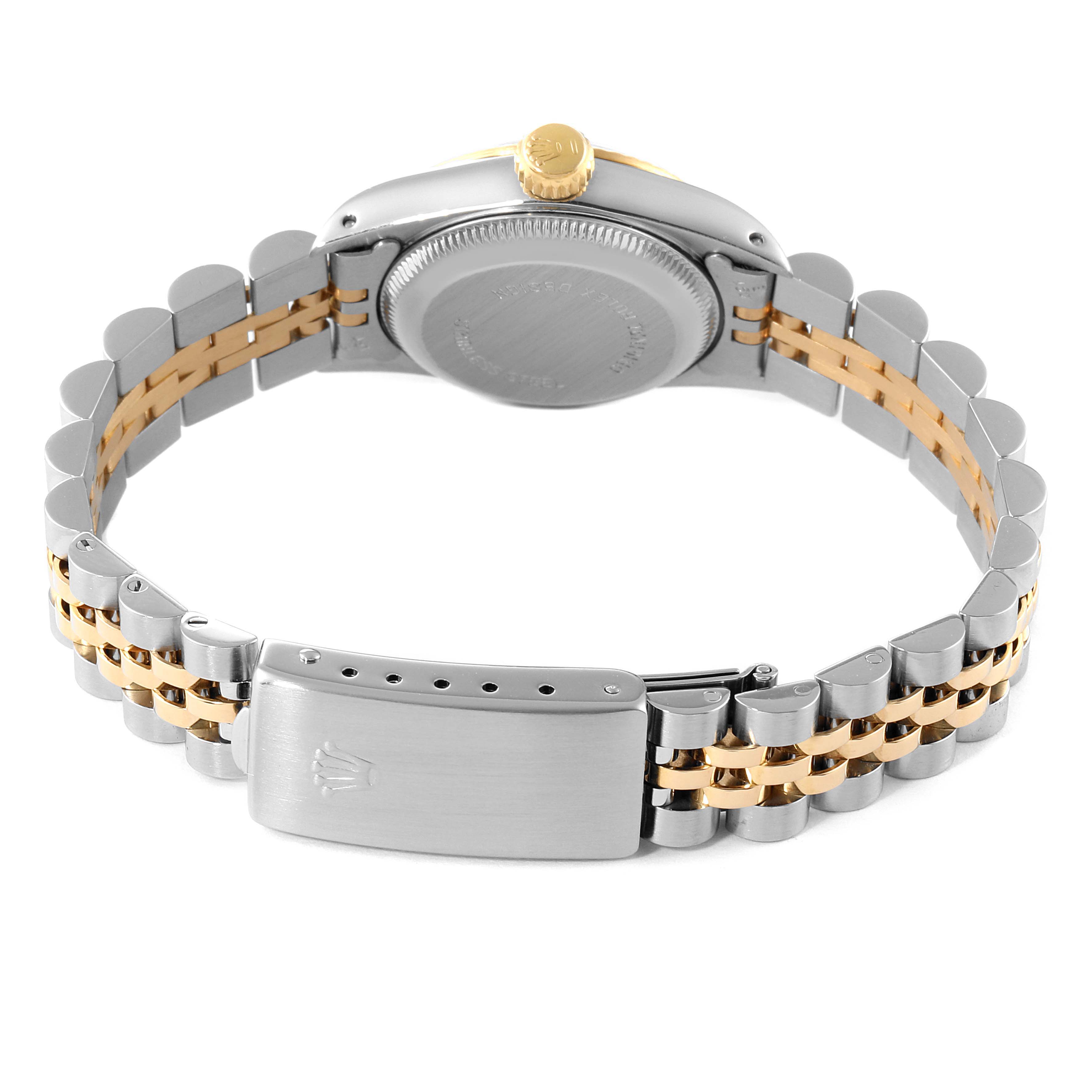 The image shows the back view of a Rolex Oyster Perpetual 67193 Women
s Steel and Gold (two tone) Champagne Dial 67193 Women
s Steel and Gold (two tone) Champagne Dial watch, featuring its case back, crown, and two-tone bracelet with the clasp.