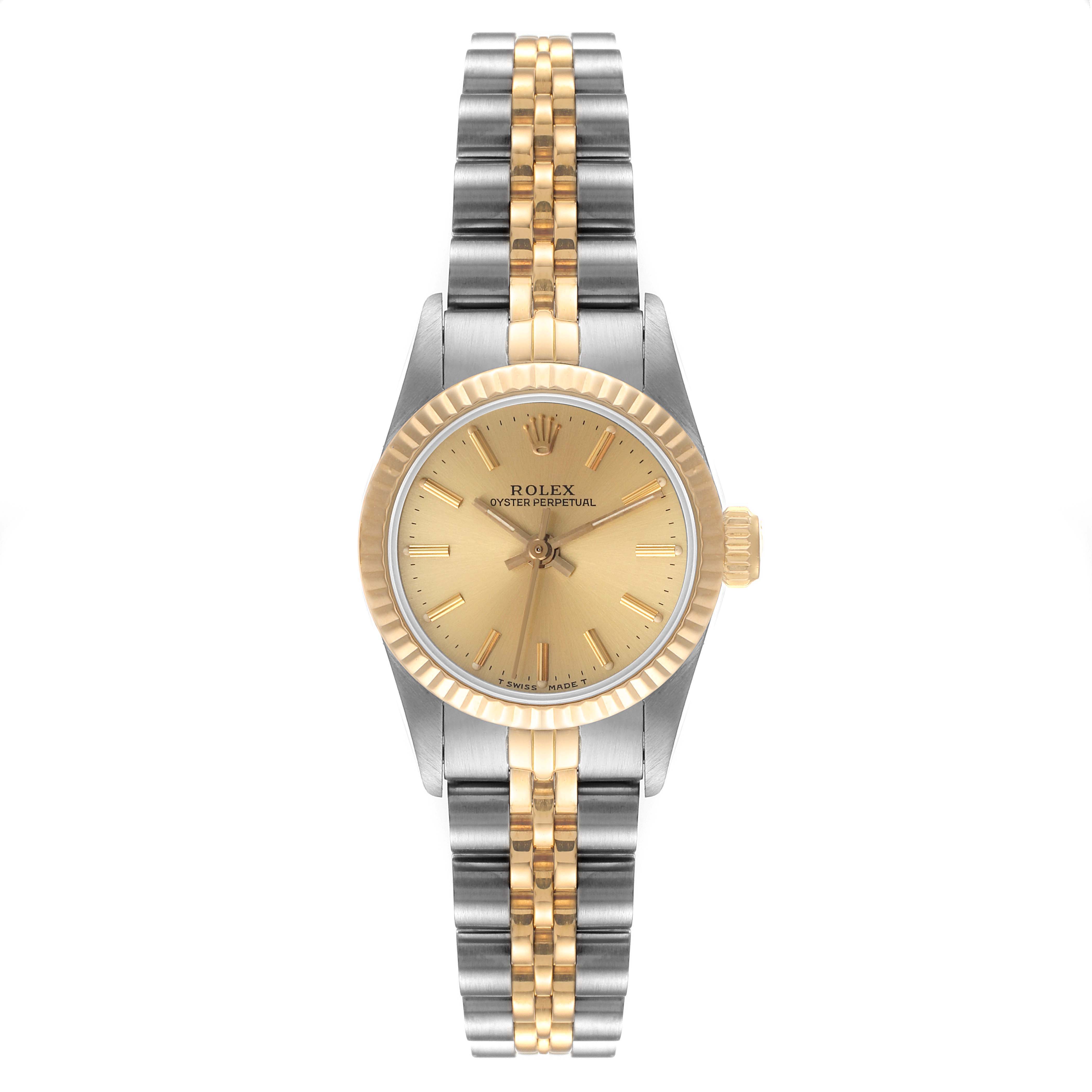 The image shows a frontal view of a Rolex Oyster Perpetual 67193 Women
s Steel and Gold (two tone) Champagne Dial 67193 Women
s Steel and Gold (two tone) Champagne Dial watch with a two-tone bracelet and gold bezel.