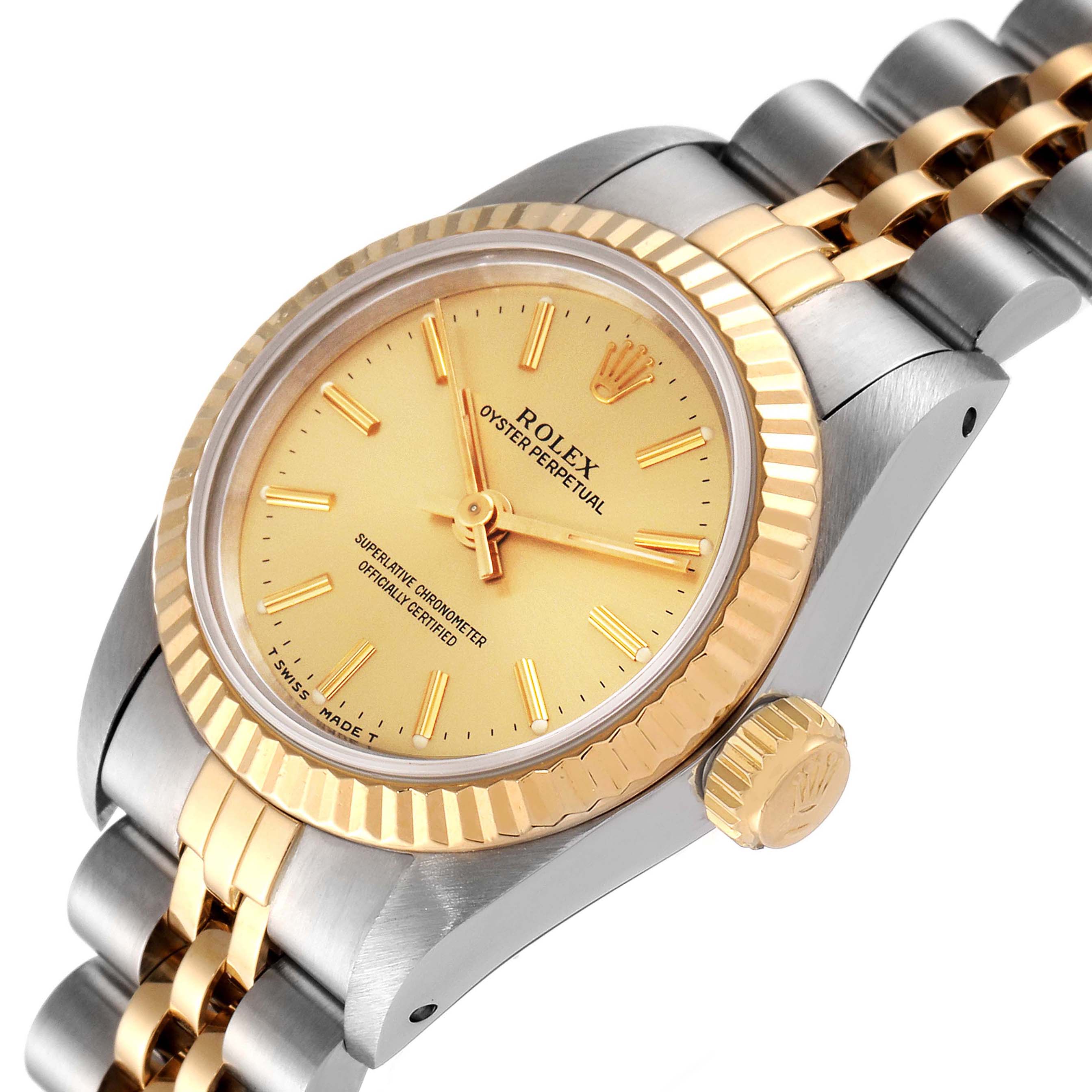 This image shows a close-up of a Rolex Oyster Perpetual 67193 Women
s Steel and Gold (two tone) Champagne Dial 67193 Women
s Steel and Gold (two tone) Champagne Dial watch, highlighting the dial, bezel, and part of the bracelet.