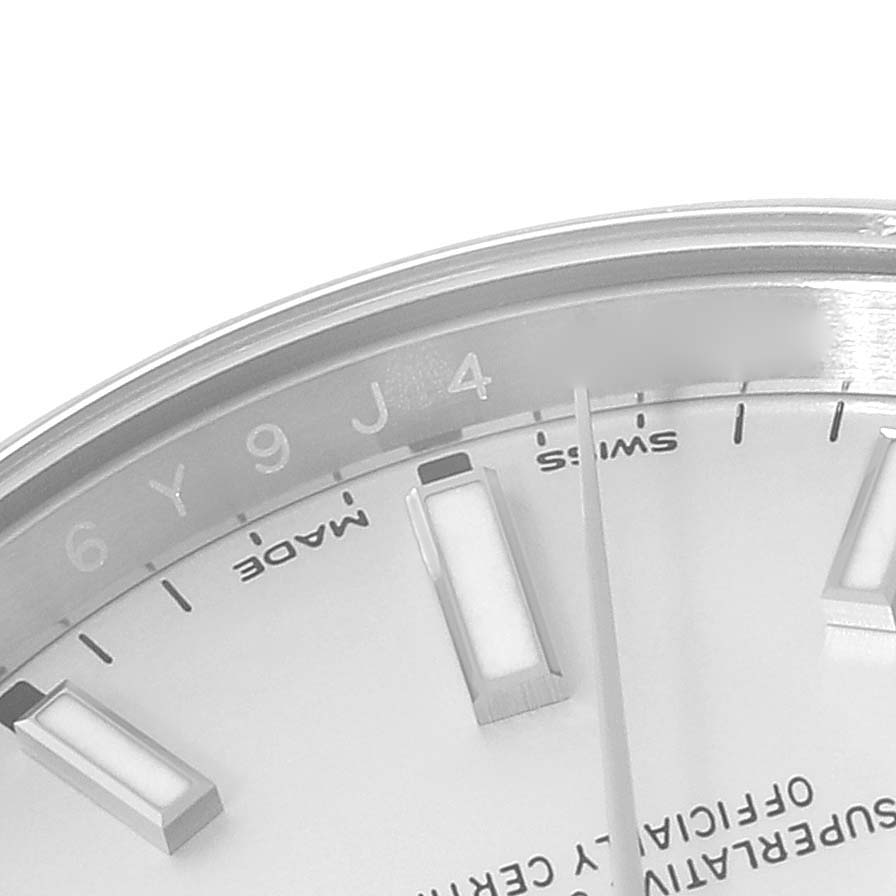 This image shows a partial close-up of the dial and bezel of a Rolex Oyster Perpetual 114200 Men
s Stainless Steel Silver Dial 114200 Men
s Stainless Steel Silver Dial watch.