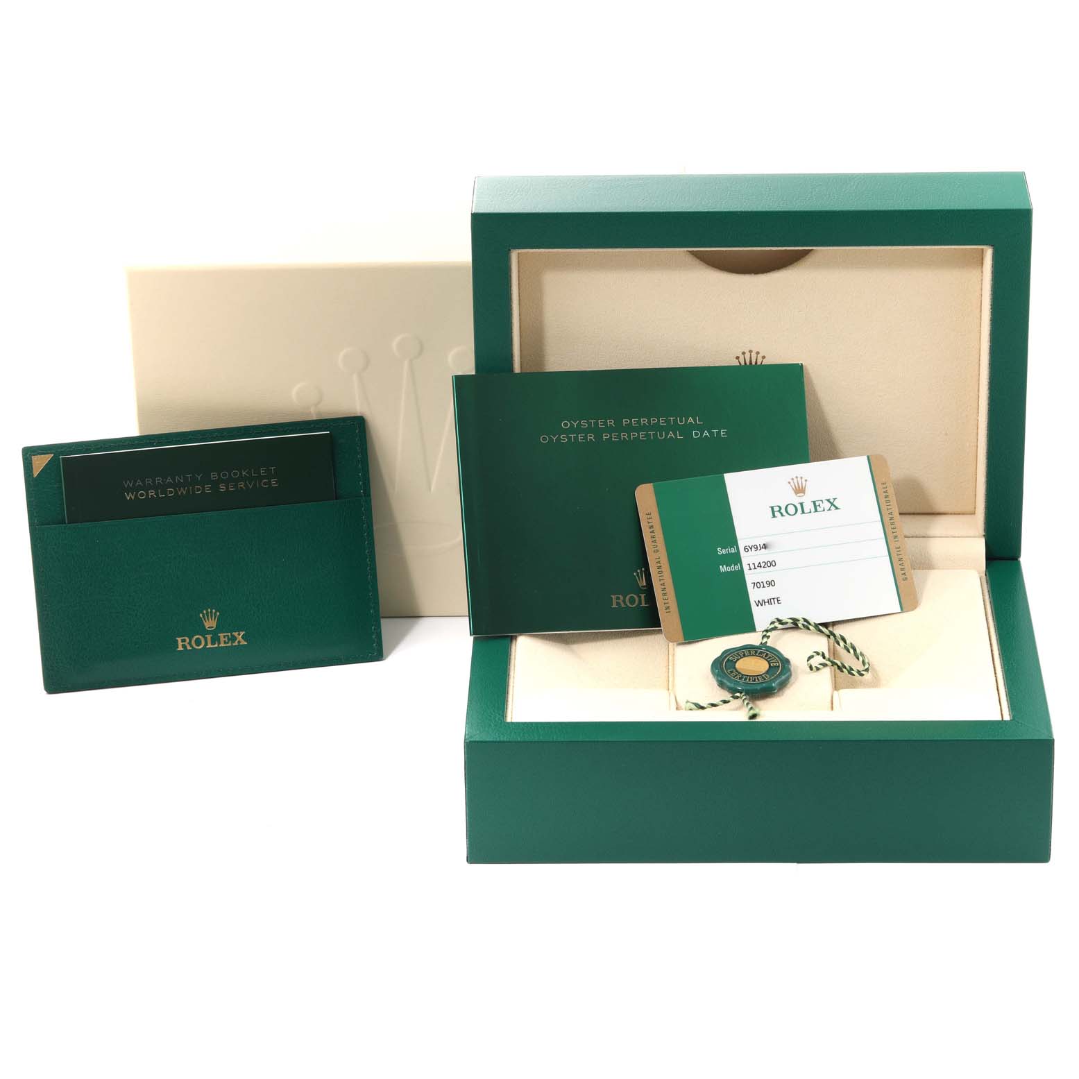 The image shows the packaging, warranty booklet, and certification card for a Rolex Oyster Perpetual 114200 Men
s Stainless Steel Silver Dial 114200 Men
s Stainless Steel Silver Dial watch.