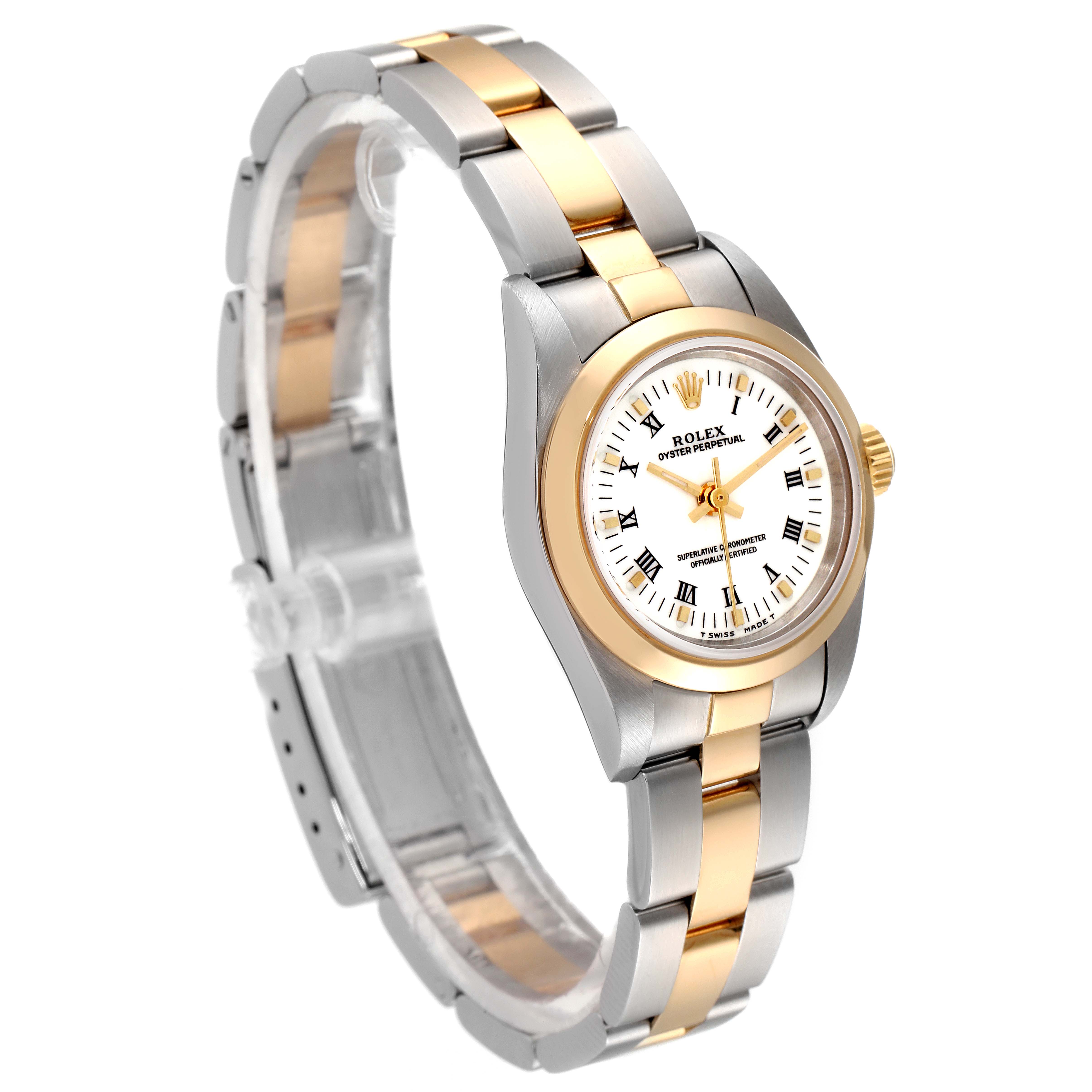 The Rolex Oyster Perpetual 76183 Women
s Steel and Gold (two tone) White Dial 76183 Women
s Steel and Gold (two tone) White Dial watch is shown at a three-quarter angle, highlighting its dual-tone metal bracelet and white dial.