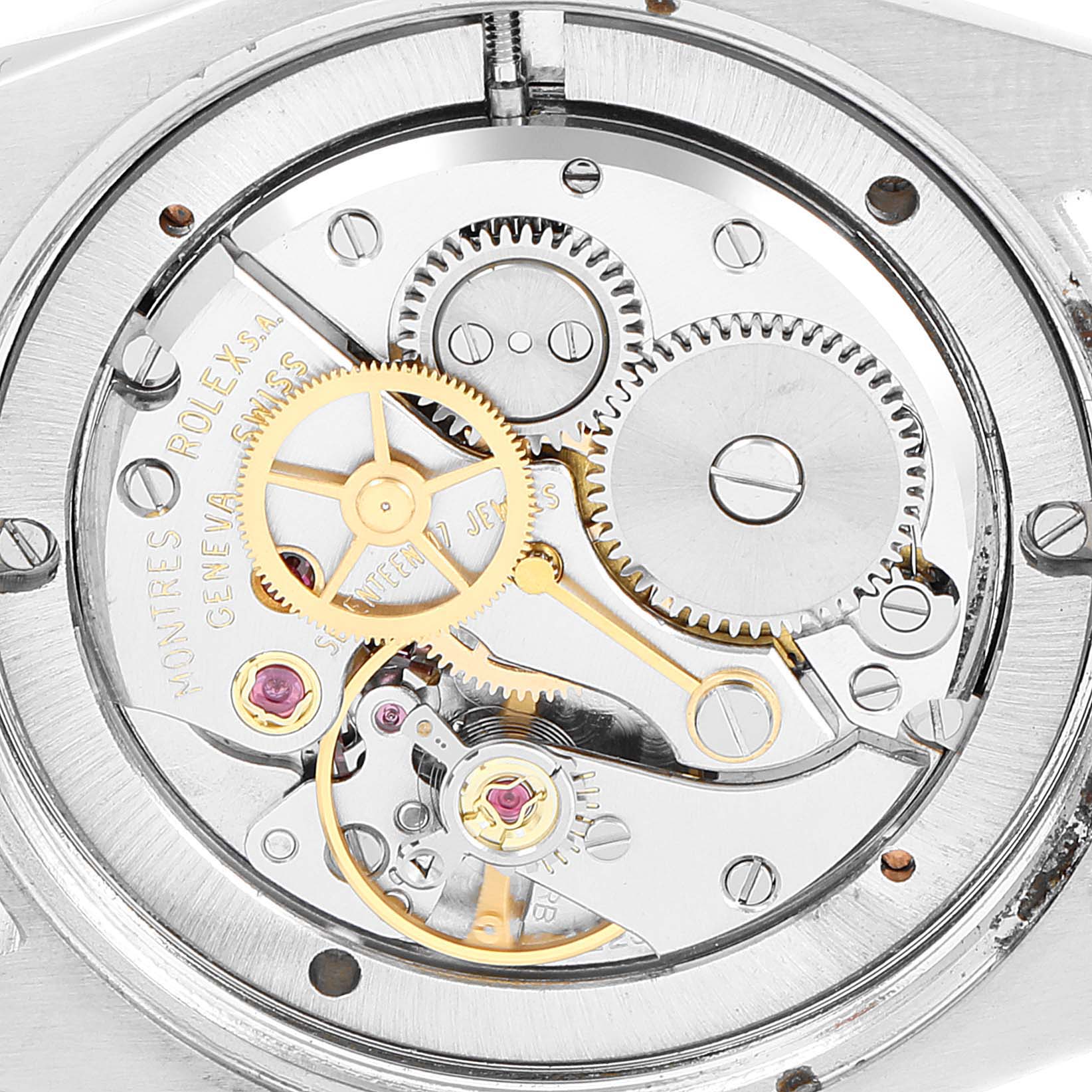 This image shows a close-up view of the movement and inner mechanics of a Rolex Vintage Collection 6694 Men's Stainless Steel Silver Dial 6694 Men's Stainless Steel Silver Dial watch.