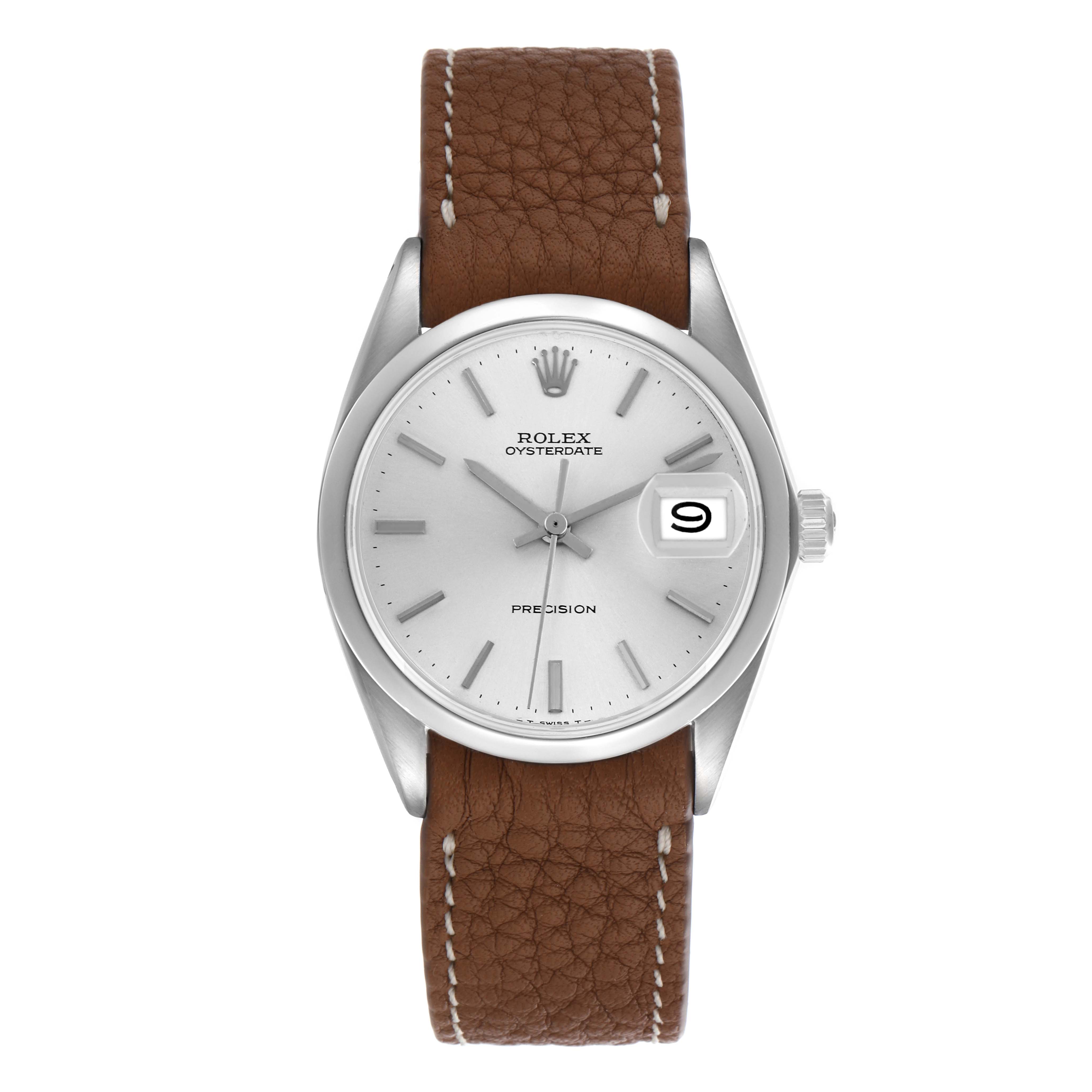 The Rolex Vintage Collection 6694 Men
s Stainless Steel Silver Dial 6694 Men
s Stainless Steel Silver Dial watch is shown from a front angle, displaying the dial, hands, crown, and a brown leather strap.