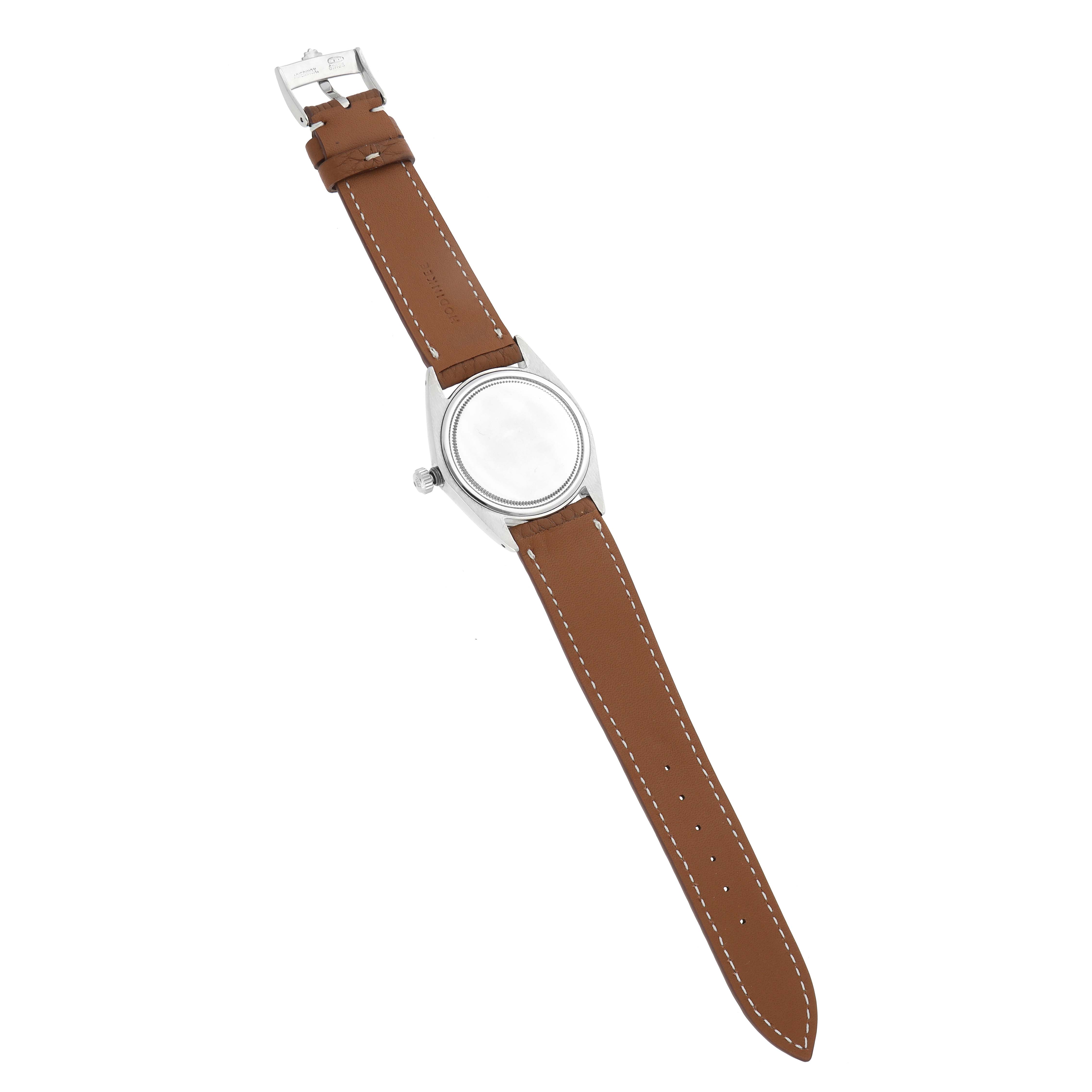 The Rolex Vintage Collection 6694 Men
s Stainless Steel Silver Dial 6694 Men
s Stainless Steel Silver Dial watch is shown from the front angle, displaying its brown leather strap and silver case.