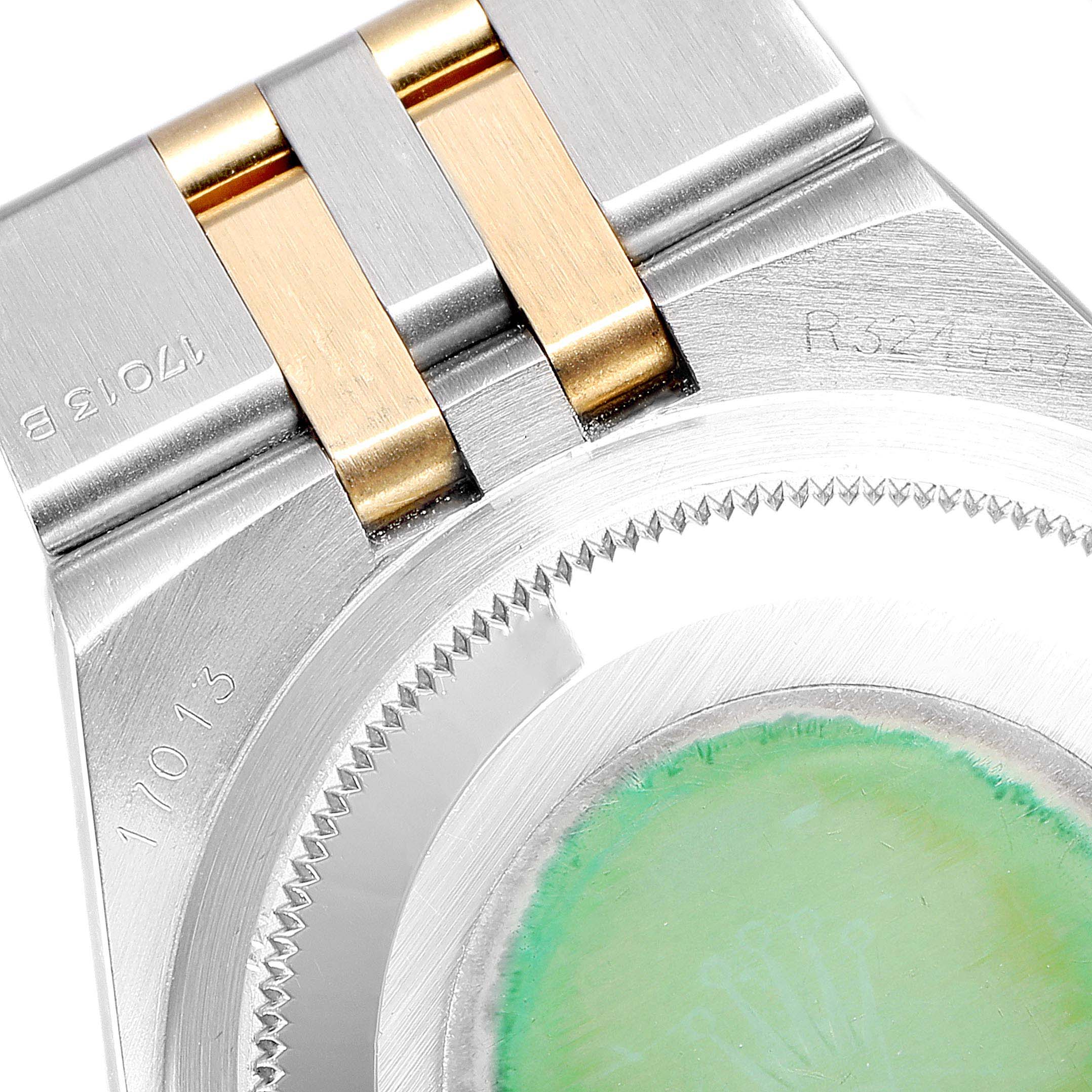 The image shows the back and lugs of a Rolex Oysterquartz 17013 Men
s Steel and Gold (two tone) Champagne Dial 17013 Men
s Steel and Gold (two tone) Champagne Dial watch model 17013, including part of the bracelet.