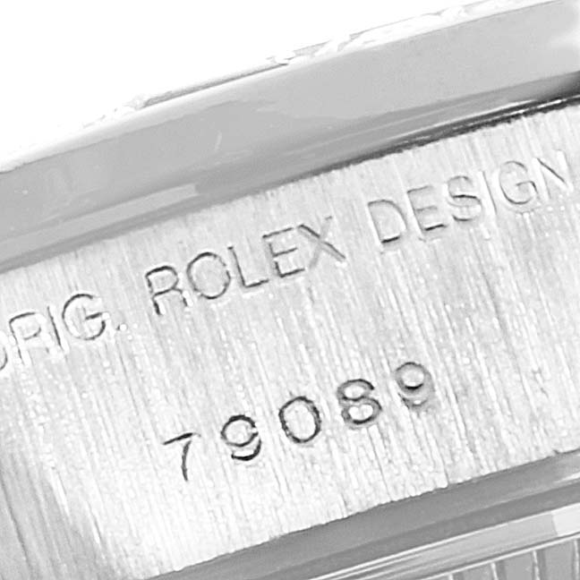 The image shows the model number and "ROLEX DESIGN" inscription on the inner side of the case of a Rolex President 79089 Women's White Gold Blue Dial 79089 Women's White Gold Blue Dial model watch.
