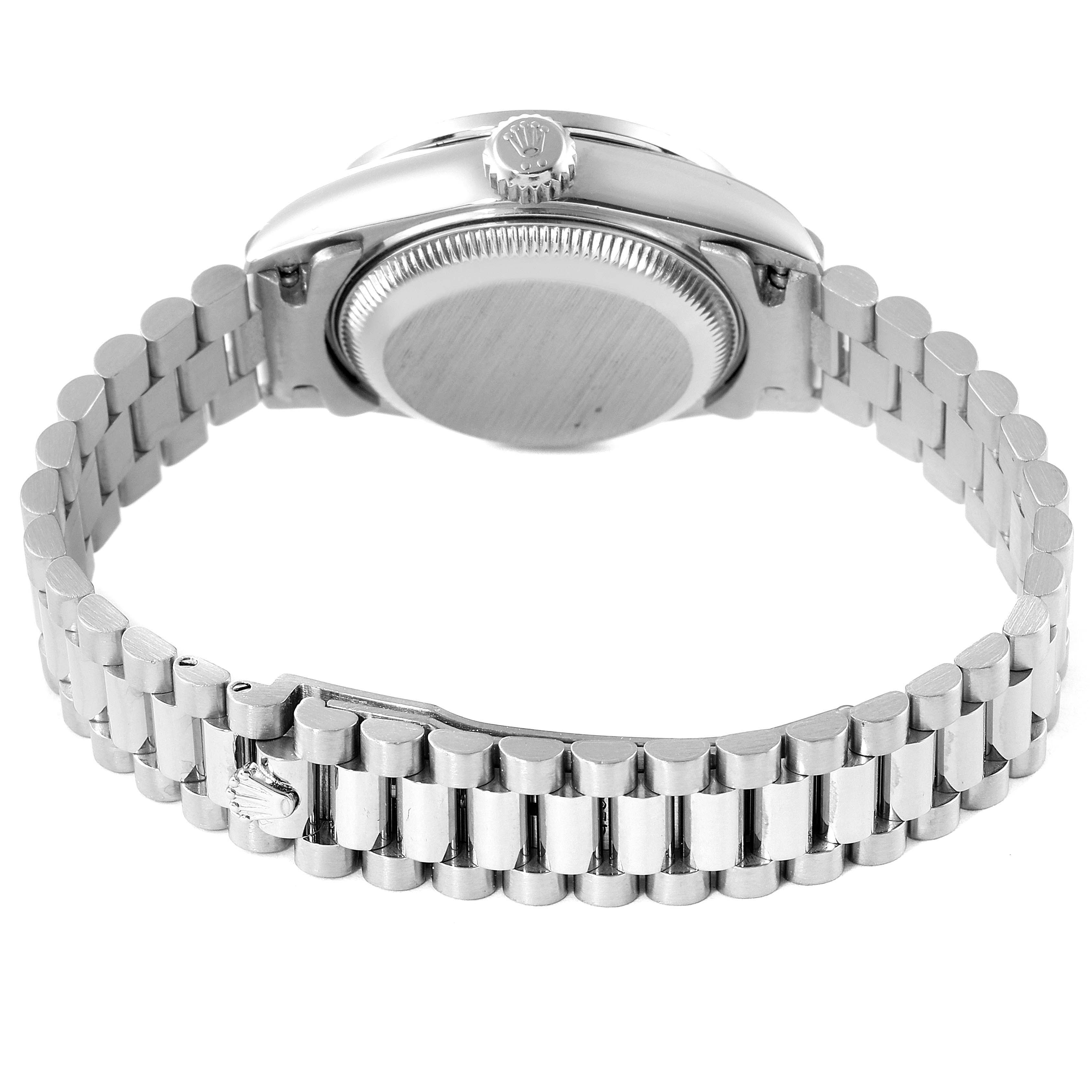 The image shows the back case and bracelet of the Rolex President 79089 Women's White Gold Blue Dial 79089 Women's White Gold Blue Dial model watch from a bottom angle.