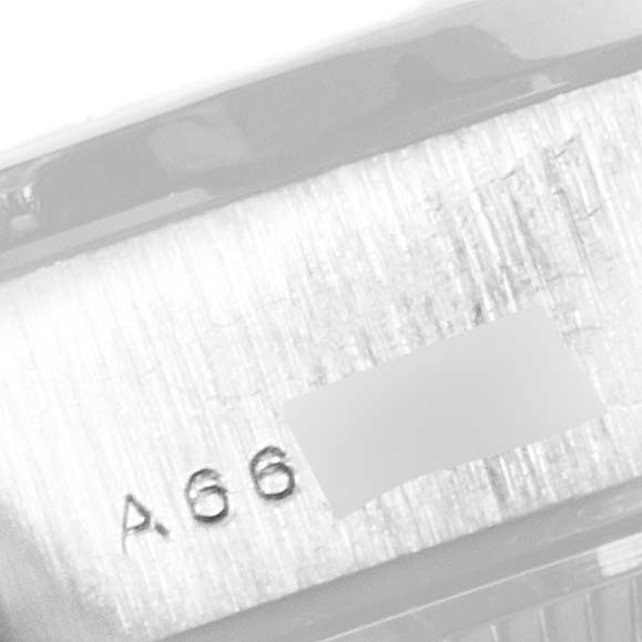 This image shows the serial number area on the President model by Rolex, viewed at a close-up angle.