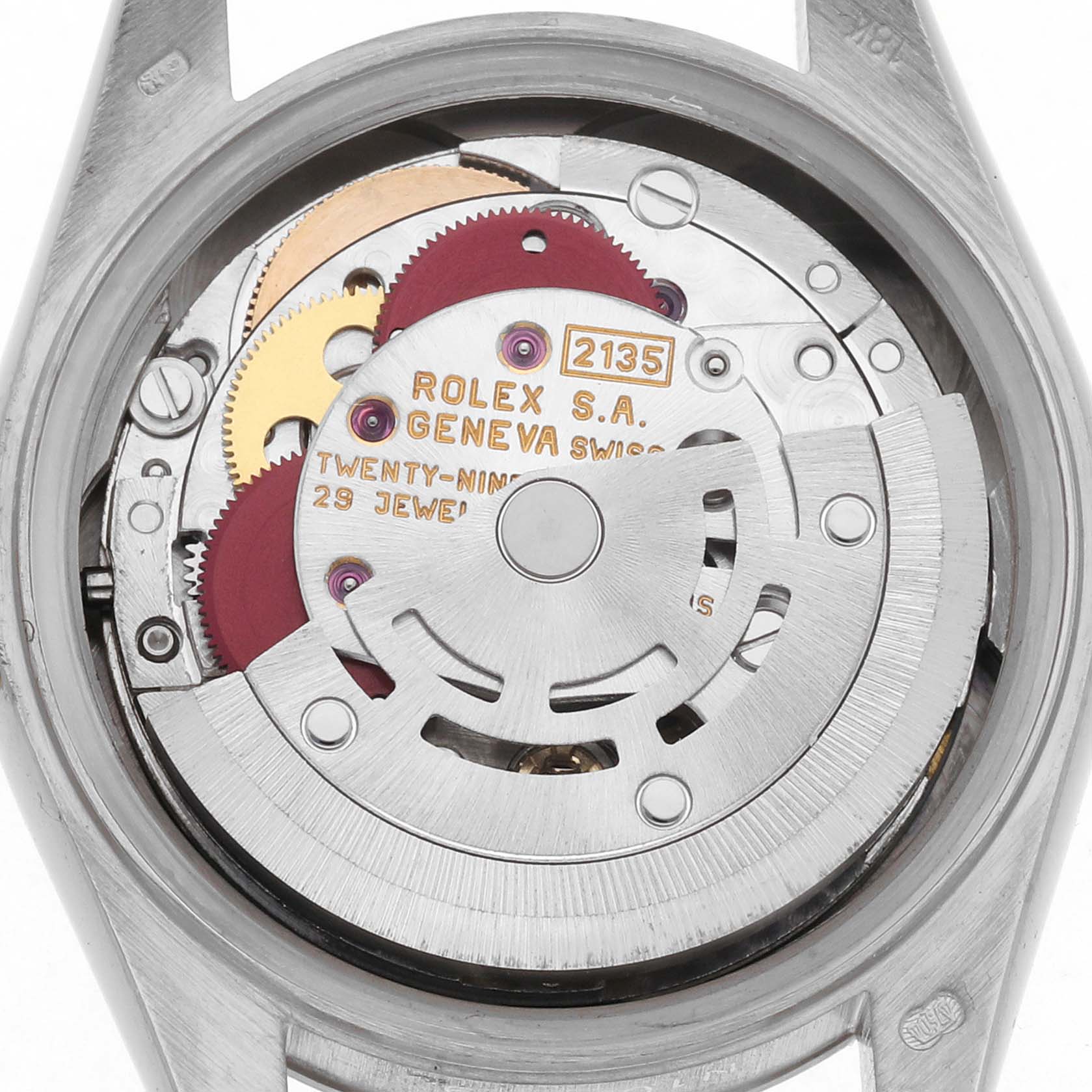 The image shows the inner mechanism of the Rolex President 69179 Women
s White Gold White Dial 69179 Women
s White Gold White Dial model watch, viewed from the back, highlighting gears and the rotor.