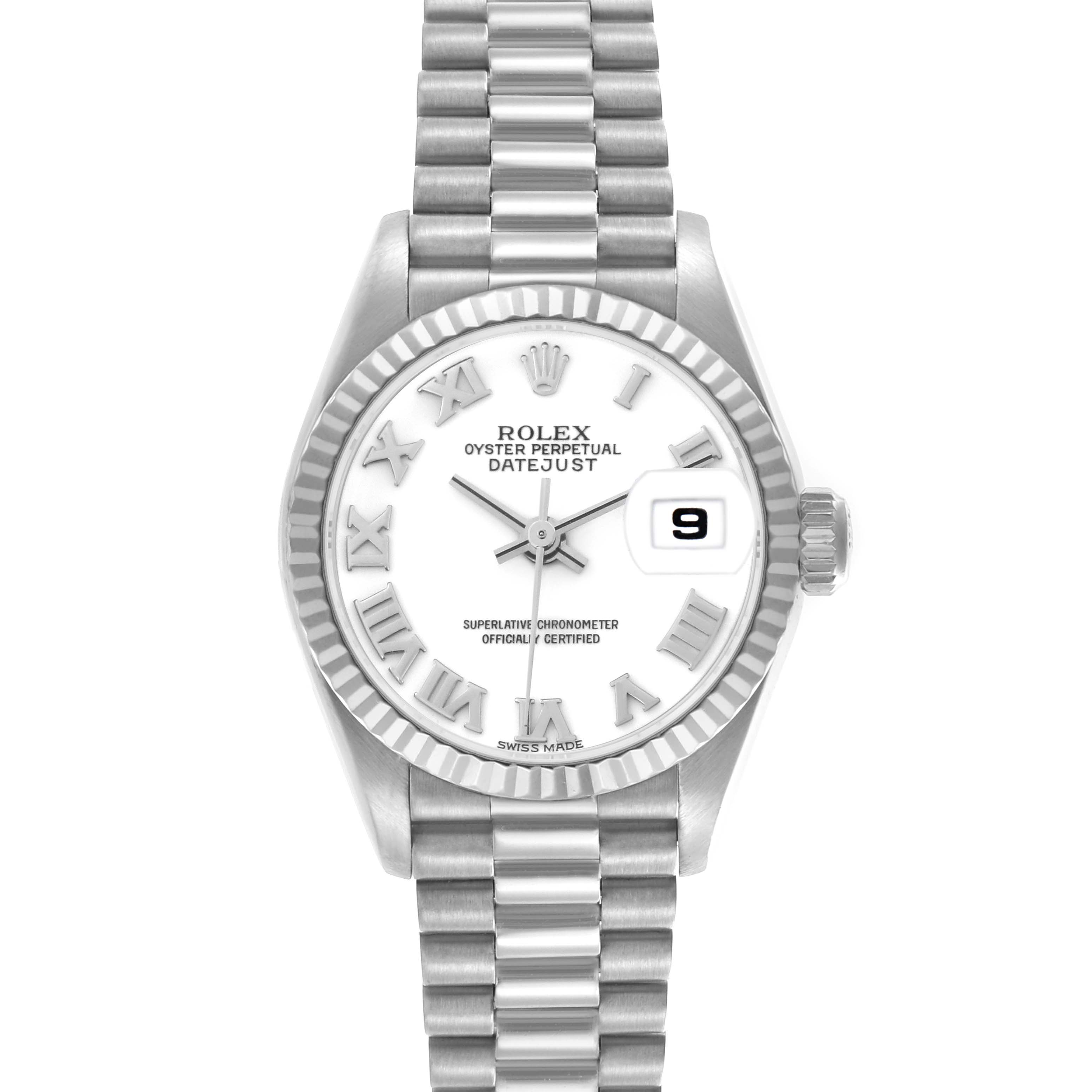 The Rolex President 69179 Women
s White Gold White Dial 69179 Women
s White Gold White Dial model watch is shown from a top-down angle, displaying its dial, bezel, and bracelet.