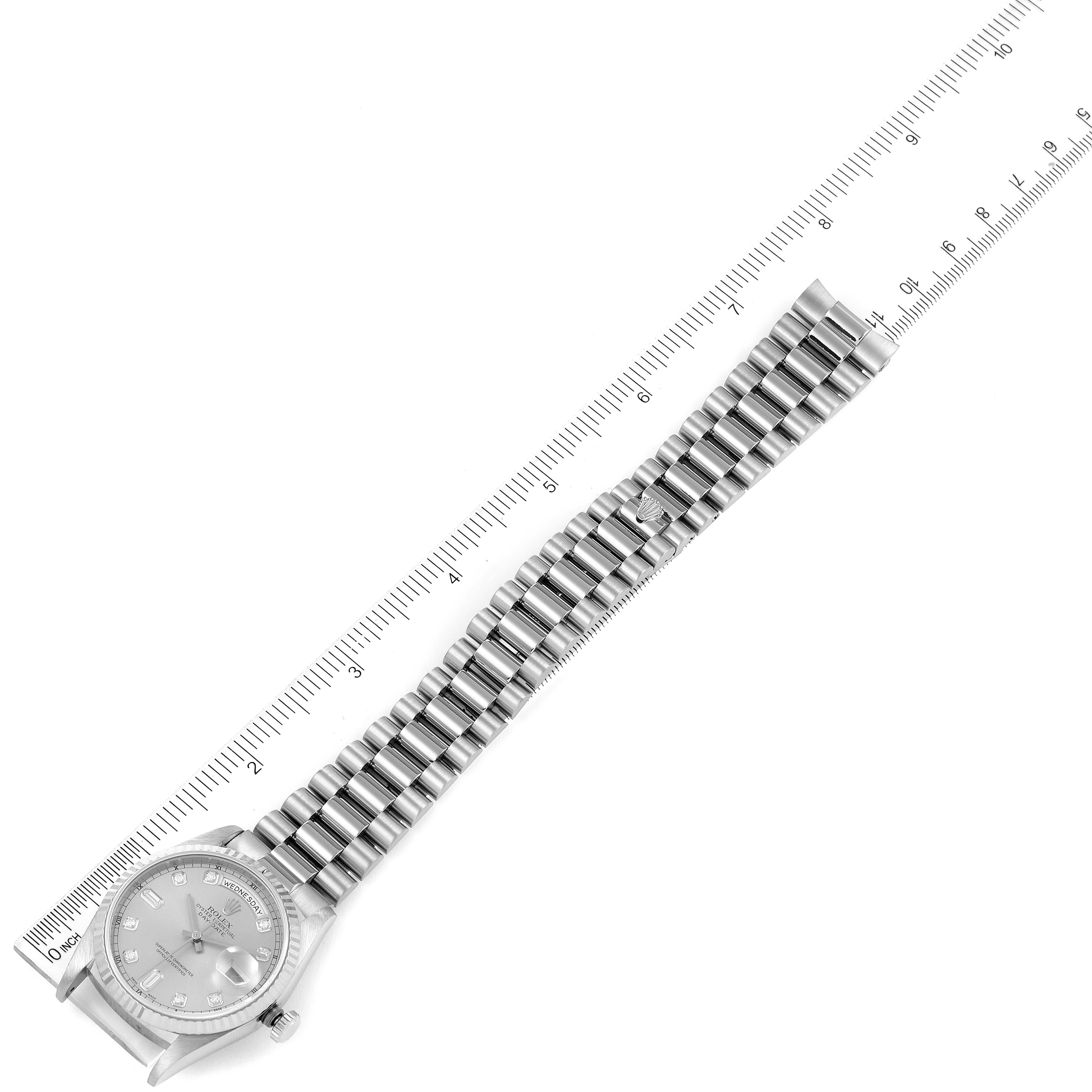 The image shows a Rolex President 18239 Men's White Gold Silver Dial 18239 Men's White Gold Silver Dial model watch laid flat with its bracelet fully extended, next to a measuring ruler.
