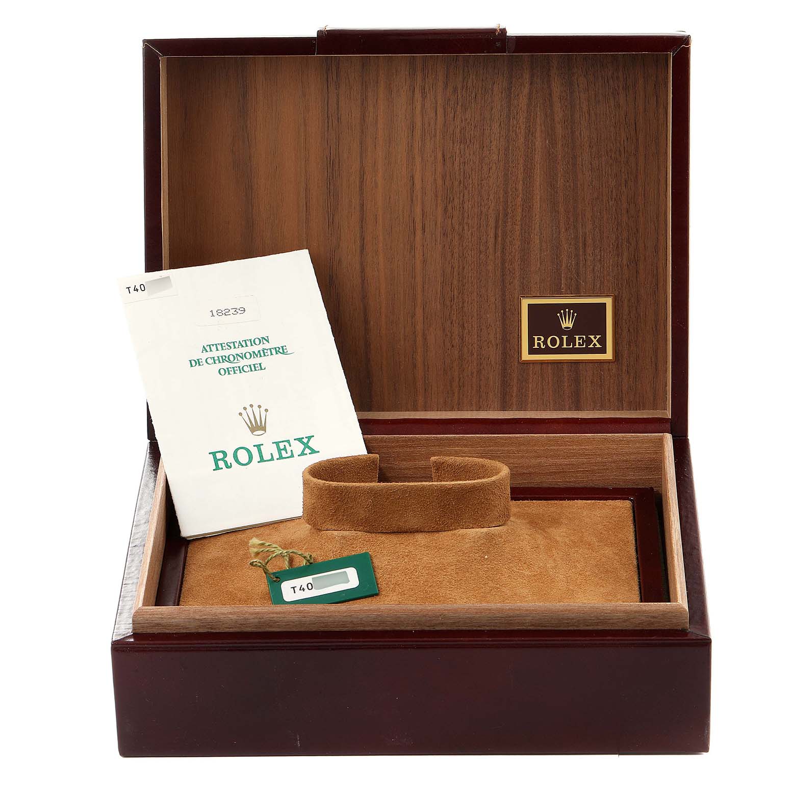 The image shows an open Rolex box for the President model, with a certificate, cushion, and tag visible.