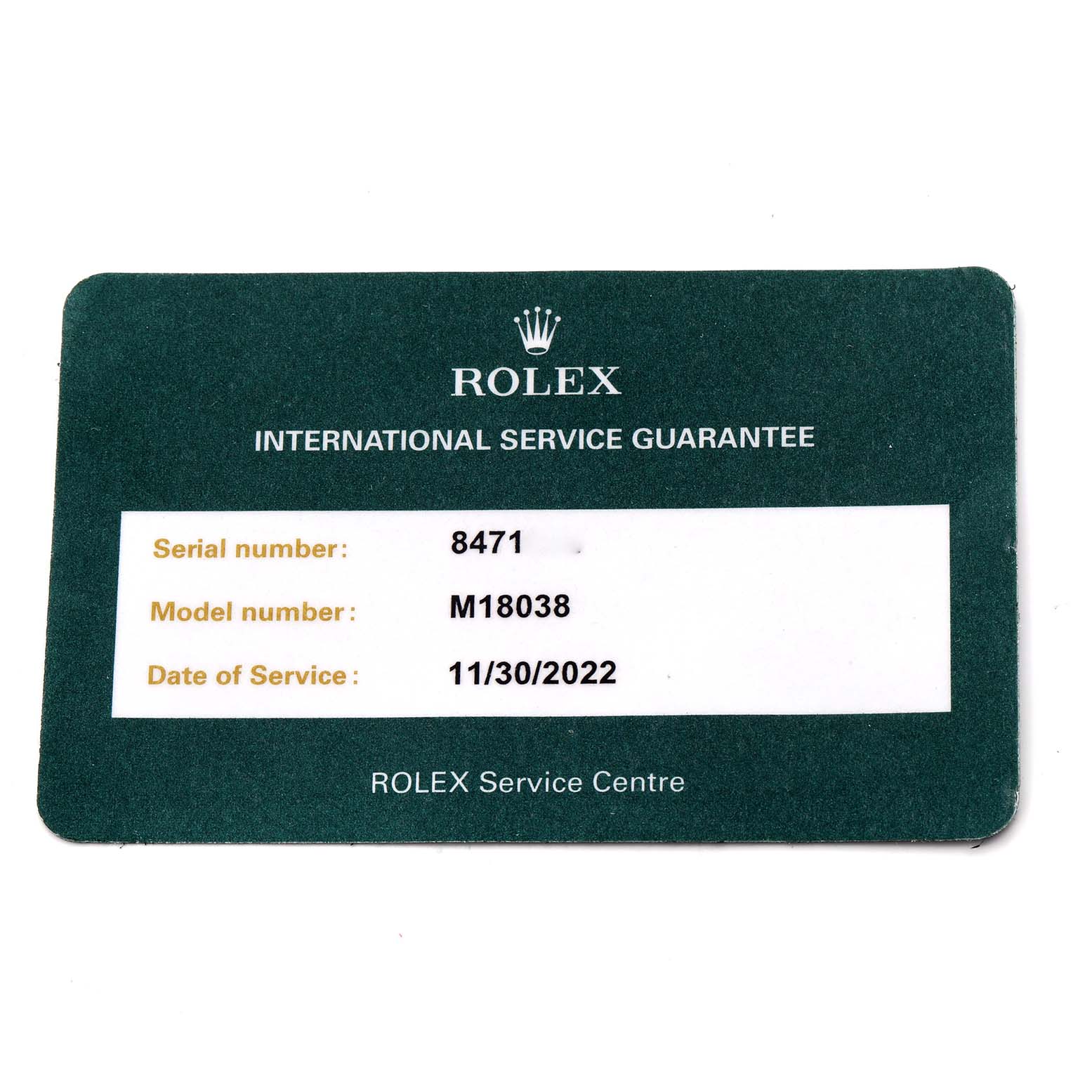 This image shows a Rolex International Service Guarantee card for the Rolex President 18038 Men
s Yellow Gold White Dial 18038 Men
s Yellow Gold White Dial model, with model number M18038.