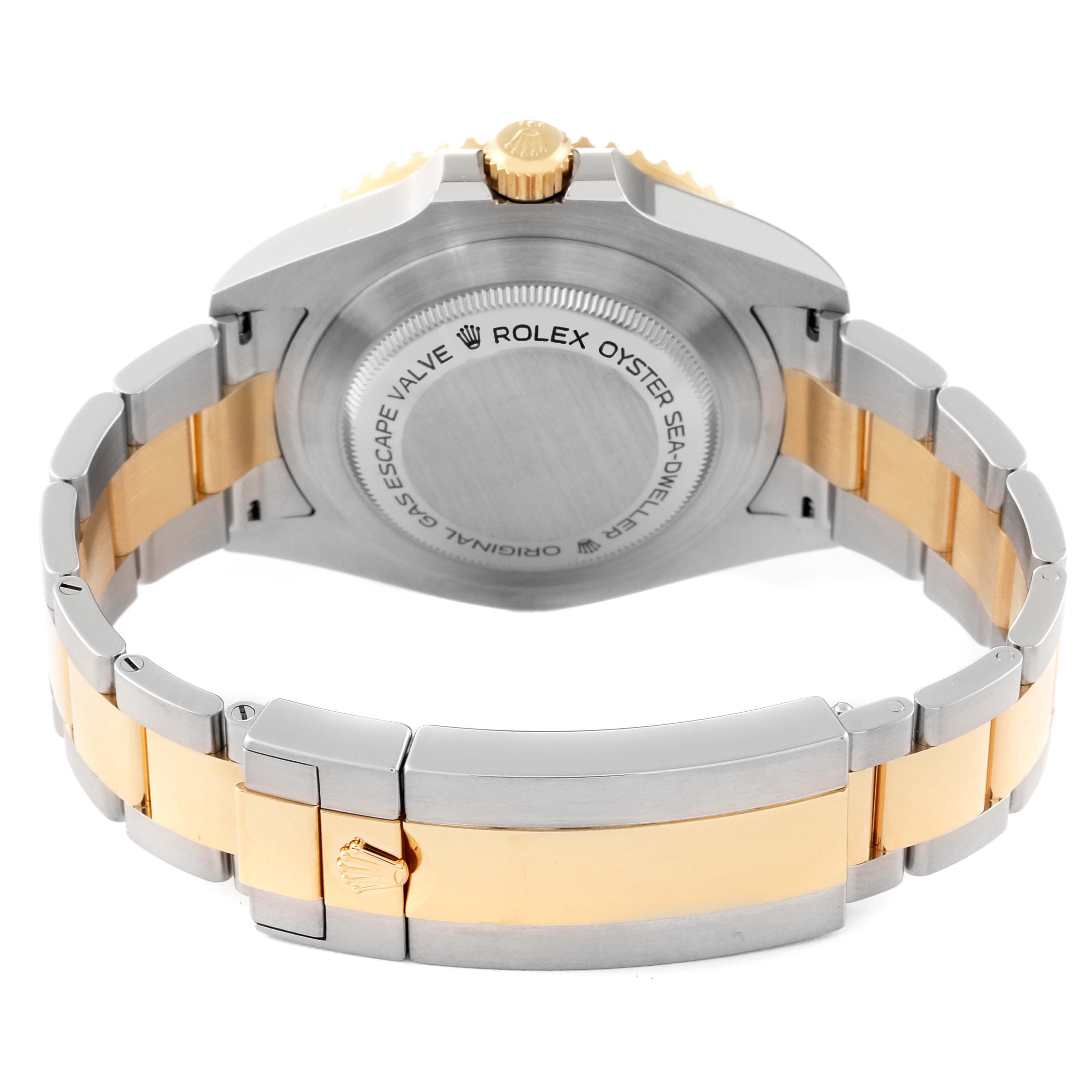 The image shows the back case and bracelet of the Rolex Sea-Dweller 126603 Men's Steel and Gold (two tone) Black Dial 126603 Men's Steel and Gold (two tone) Black Dial watch at a slightly angled rear view.