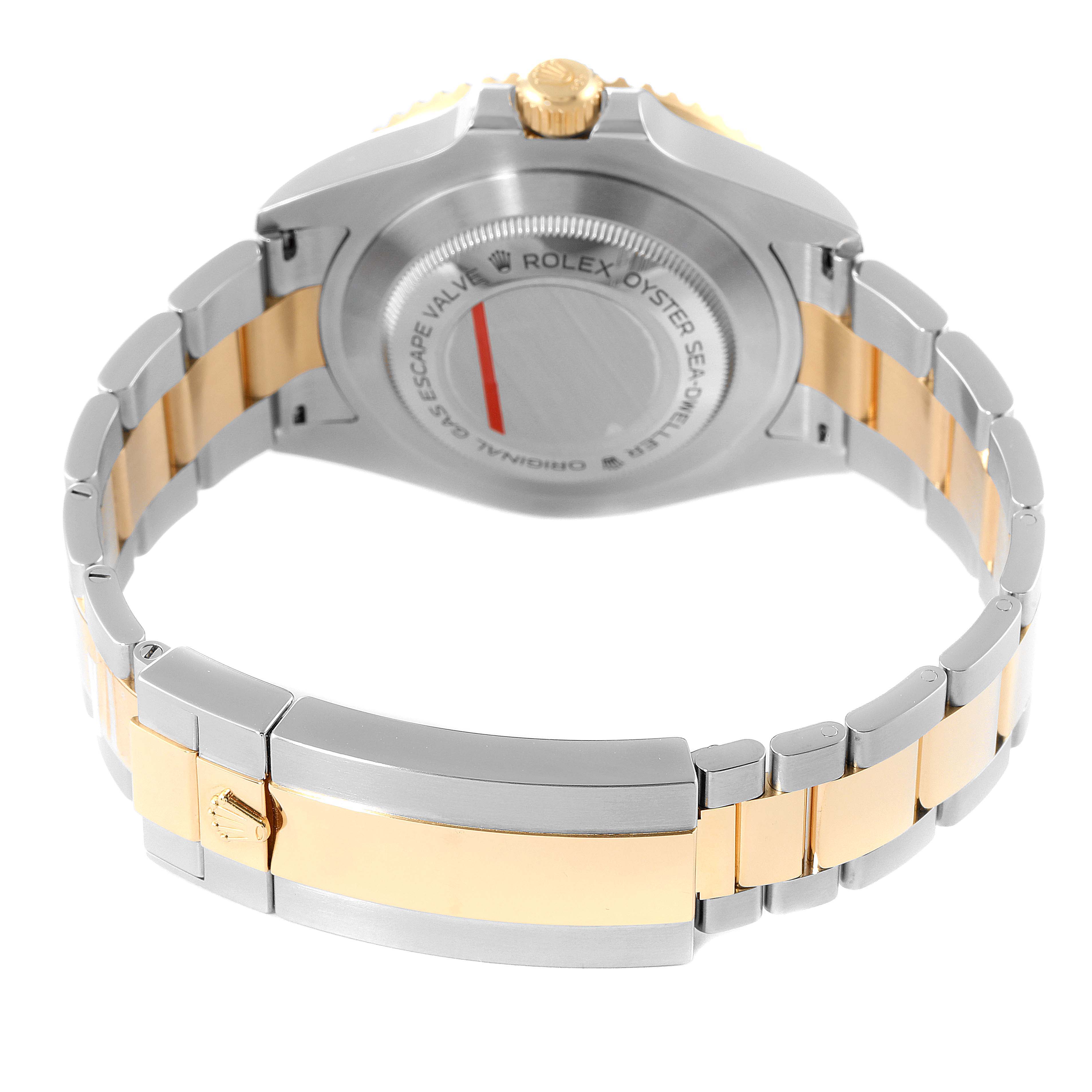 This image shows the back case and bracelet of a Rolex Sea-Dweller 126603 Men's Steel and Gold (two tone) Black Dial 126603 Men's Steel and Gold (two tone) Black Dial watch, highlighting the clasp and crown.