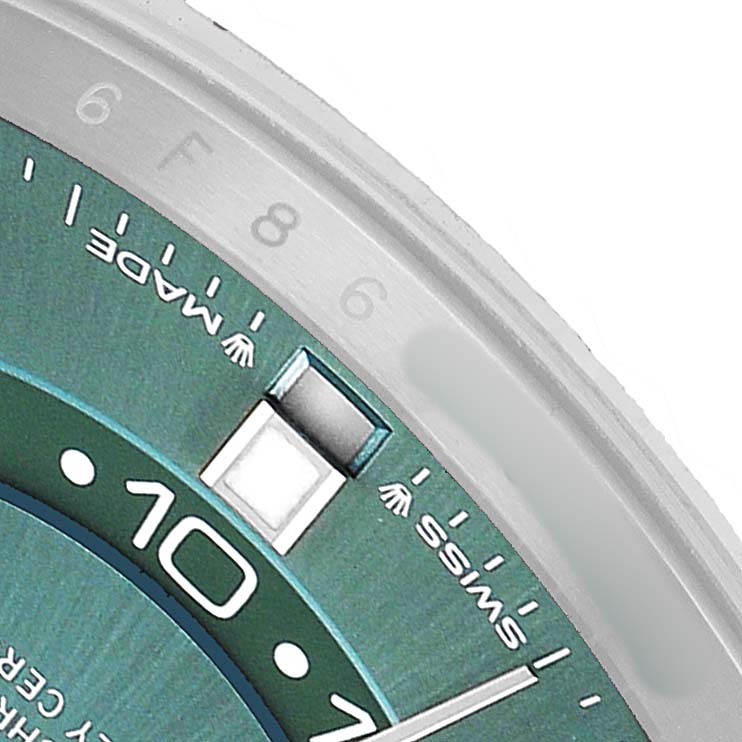 The image shows a close-up of the Rolex Sky-Dweller 336934 Men's Stainless Steel Green Dial watch face, focusing on the dial and date window.