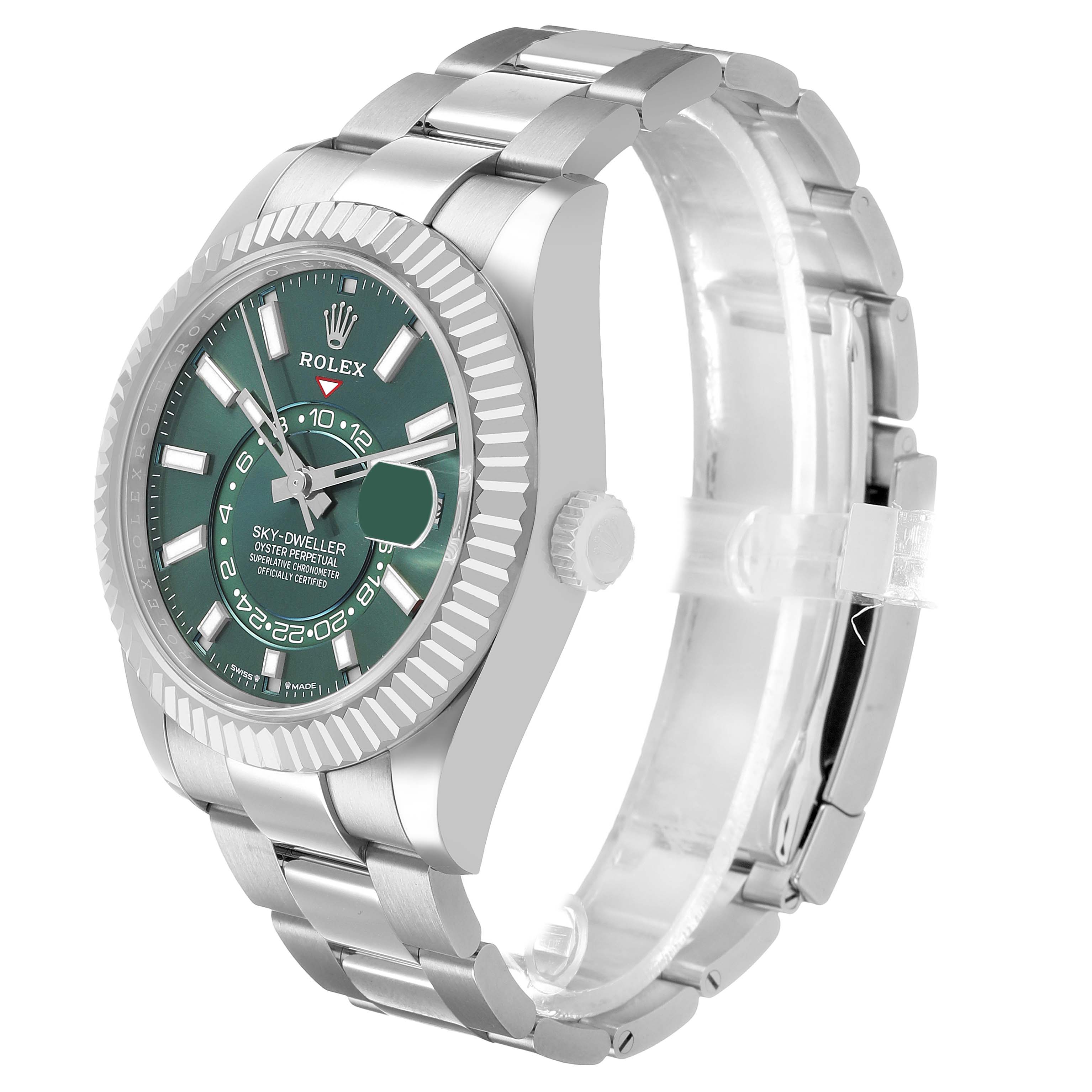 The Rolex Sky-Dweller 336934 Men's Stainless Steel Green Dial is shown at a side angle, highlighting the watch face, bezel, case, and part of the bracelet.