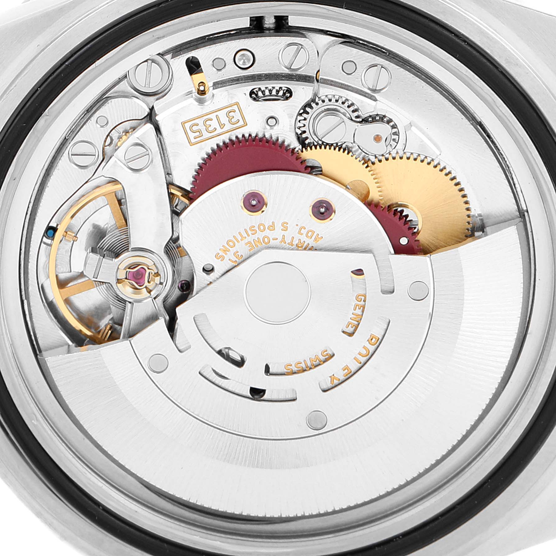 The image shows the internal mechanism of a Rolex Submariner 16610 Men's Stainless Steel Black Dial 16610 Men's Stainless Steel Black Dial watch from a rear angle.