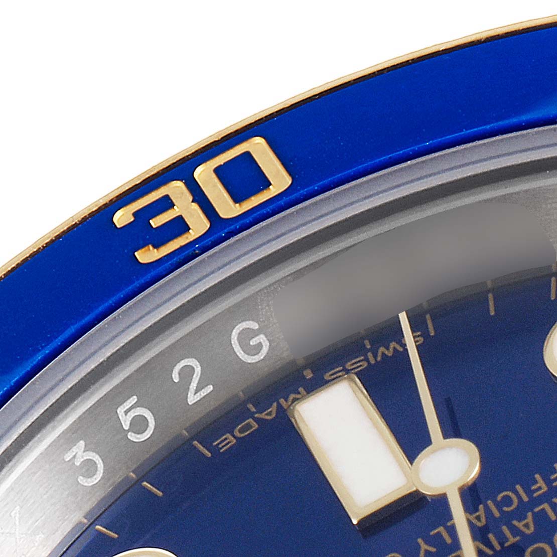 This close-up of the Rolex Submariner 116613 Men
s Steel and Gold (two tone) Blue Dial 116613 Men
s Steel and Gold (two tone) Blue Dial watch shows the bezel with a "30" marking and part of the watch dial.
