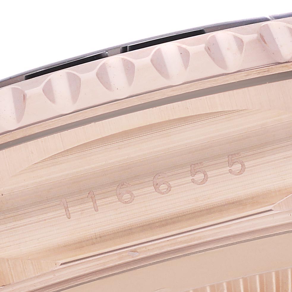 The image shows a close-up of the Rolex Yacht-Master 116655 Men
s Rose Gold Black Dial 116655 Men
s Rose Gold Black Dial model
s bezel and part of the case with the reference number.