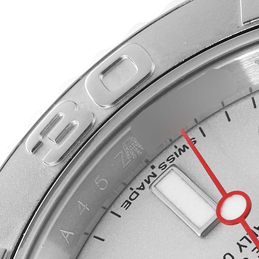 The image shows a close-up of the Rolex Yacht-Master 116622 Men's Stainless Steel Silver Dial 116622 Men's Stainless Steel Silver Dial watch's bezel, part of the dial, and the 'Swiss Made' marking.