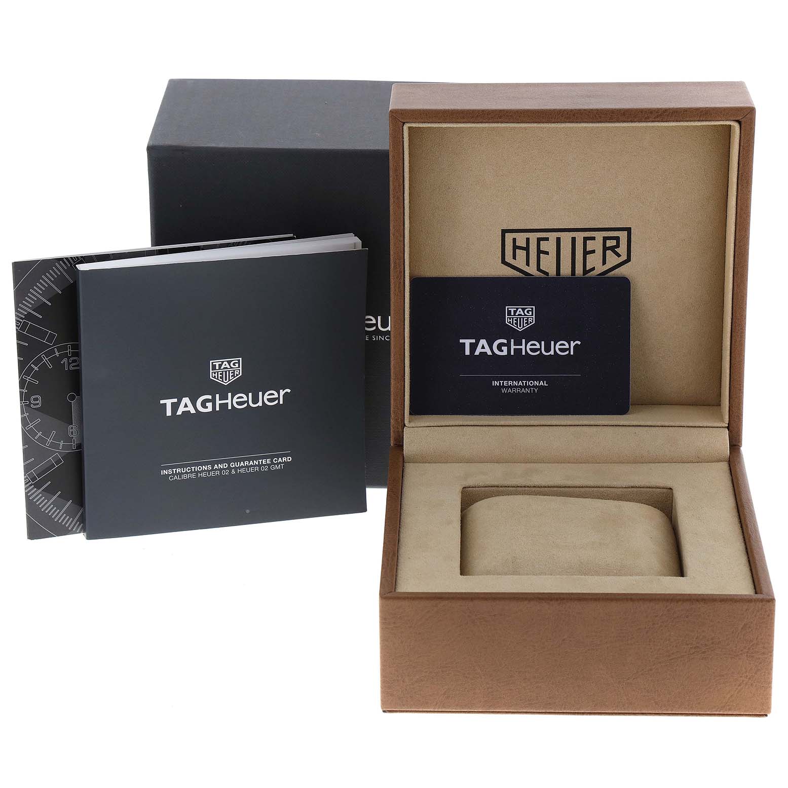 The image shows the Tag Heuer Autavia CBE2110.BA0687 Men's Stainless Steel Black Dial CBE2110.BA0687 Men's Stainless Steel Black Dial watch display box, guarantee card, and instruction manual.