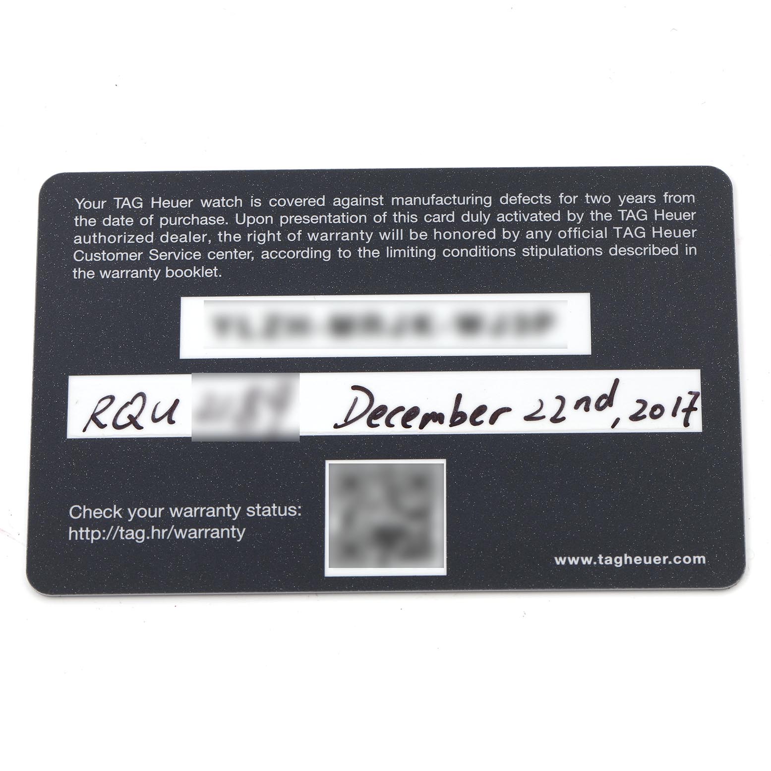 The image shows a warranty card for a Tag Heuer Carrera CAR2A1Z Men
s Stainless Steel Black Dial CAR2A1Z Men
s Stainless Steel Black Dial watch, displaying text and date details.
