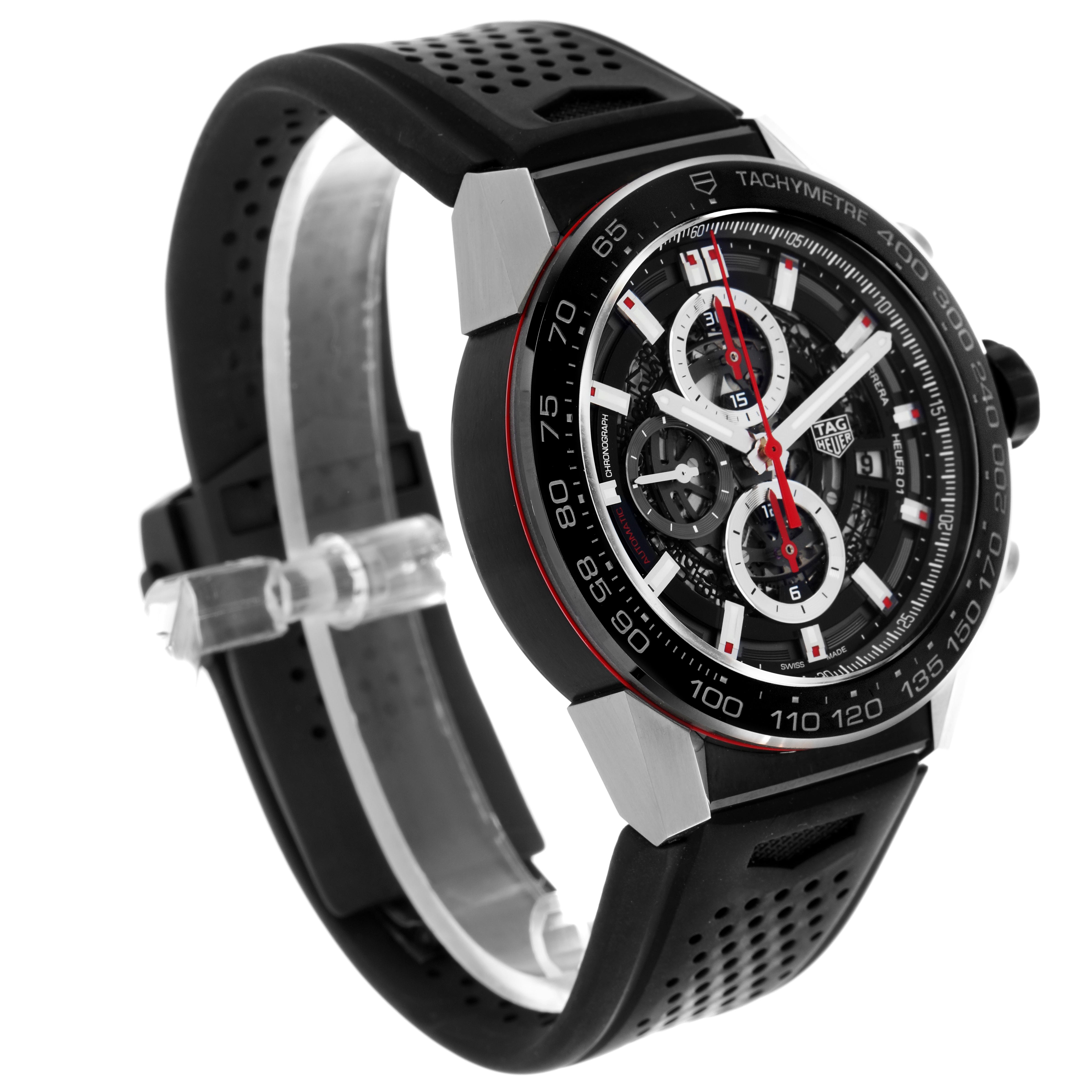 The Tag Heuer Carrera CAR2A1Z Men
s Stainless Steel Black Dial CAR2A1Z Men
s Stainless Steel Black Dial watch is shown at a three-quarter angle, displaying its black rubber strap, tachymeter bezel, and detailed dial.