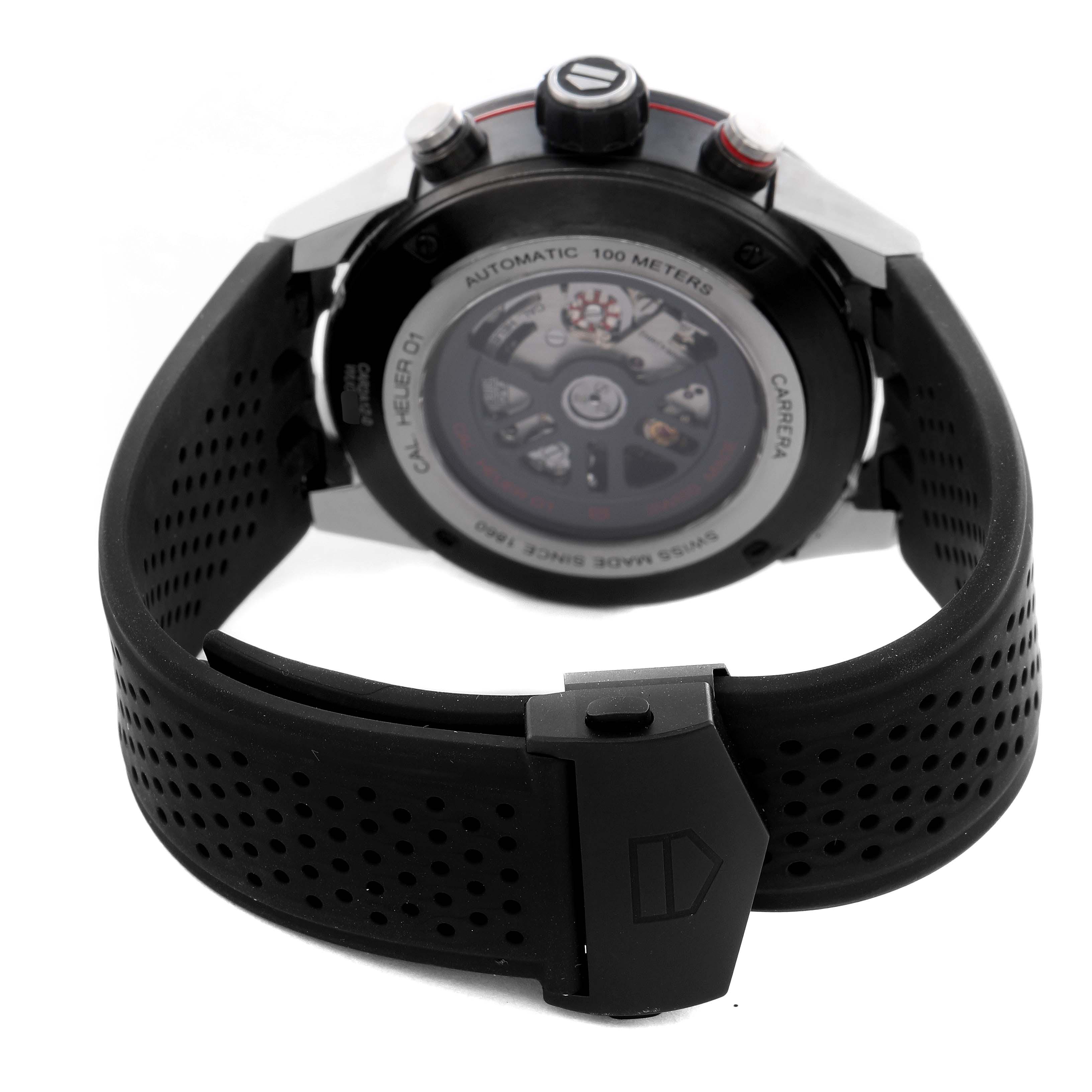 The Tag Heuer Carrera CAR2A1Z-0 Men
s Stainless Steel Black Dial CAR2A1Z-0 Men
s Stainless Steel Black Dial watch is shown from the back, highlighting the case back, crown, pushers, and perforated strap.