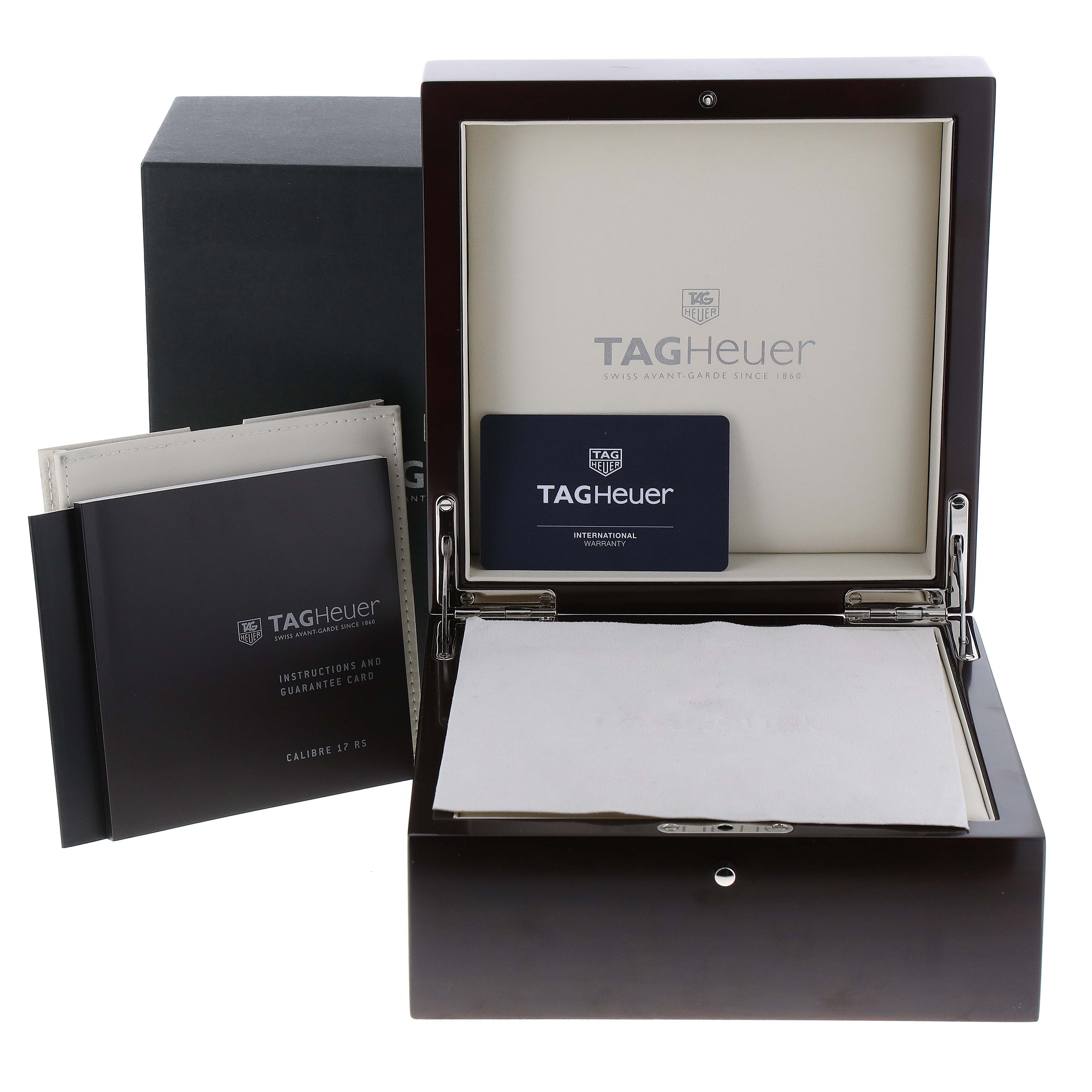 This image shows the packaging, instructions, warranty card, and presentation box for the Tag Heuer Carrera CAV518B.FT6016 Men's Stainless Steel Black Dial CAV518B.FT6016 Men's Stainless Steel Black Dial model watch.