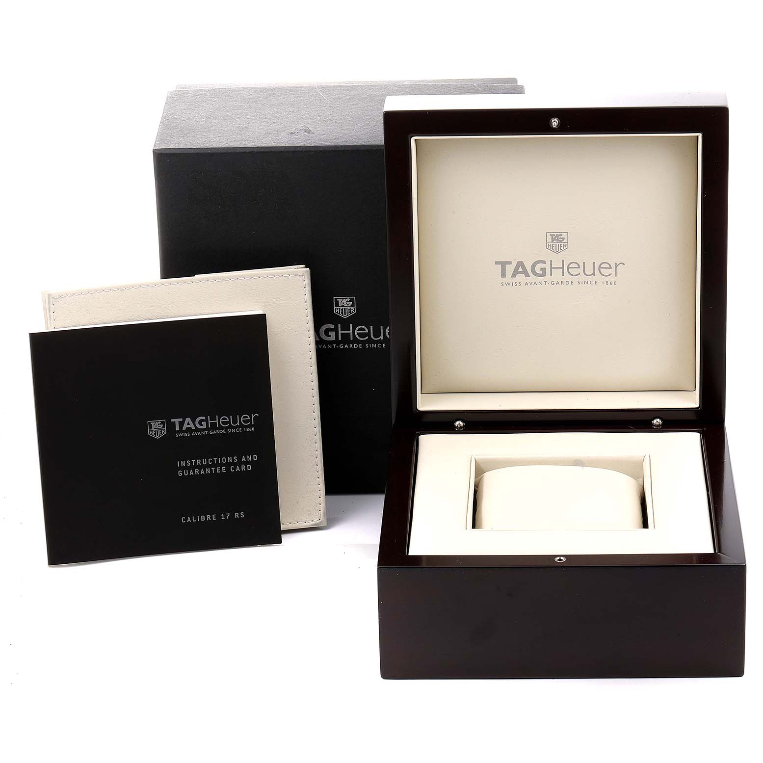 The image shows the packaging, instruction manual, and guarantee card for a Tag Heuer Carrera CAV511B.FC6231 Men's Stainless Steel Silver Dial CAV511B.FC6231 Men's Stainless Steel Silver Dial watch.