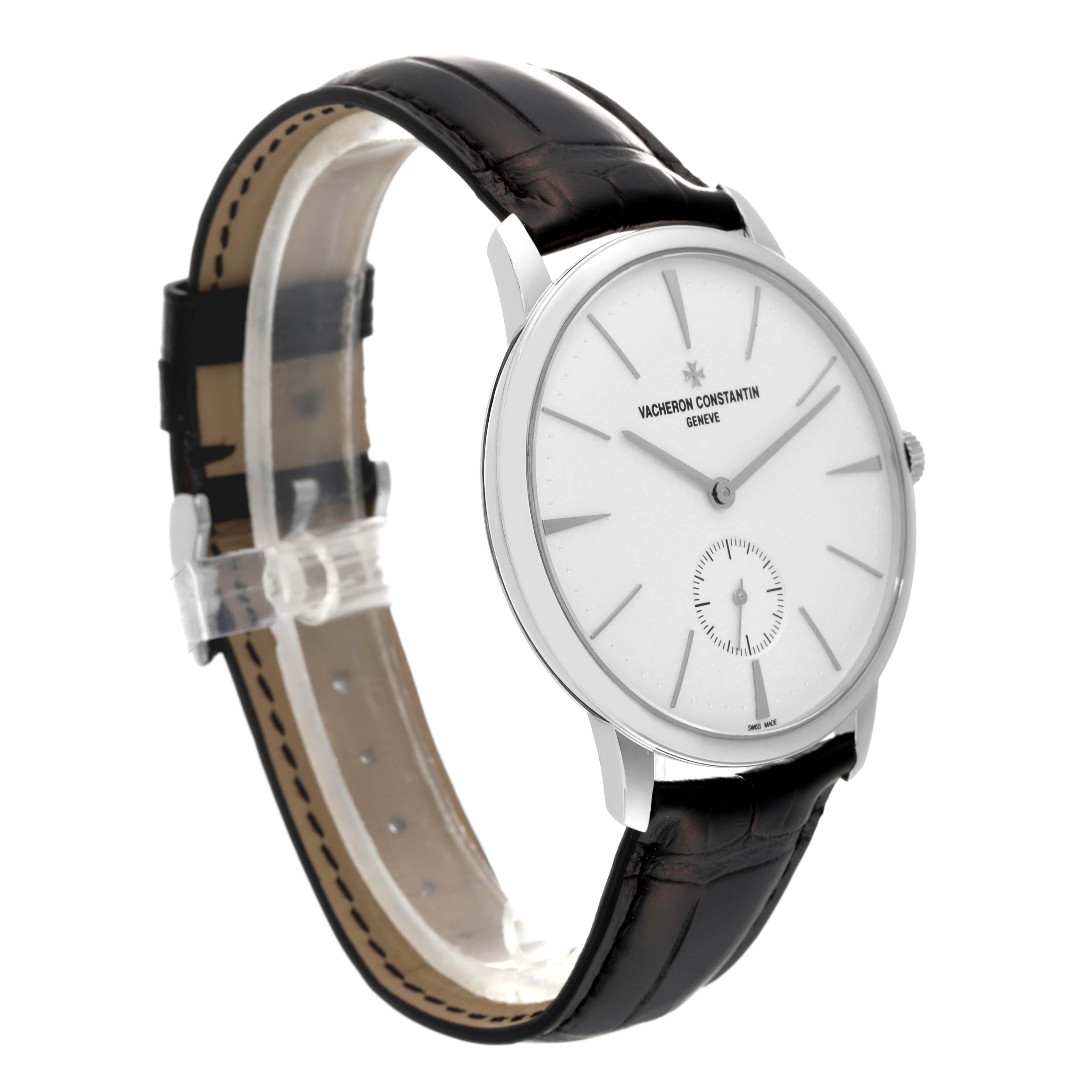 The image shows a Vacheron Constantin Patrimony 1110U/000G-B086 Men's White Gold Silver Dial 1110U/000G-B086 Men's White Gold Silver Dial watch at an angled side view, highlighting the face, case, crown, and leather strap.