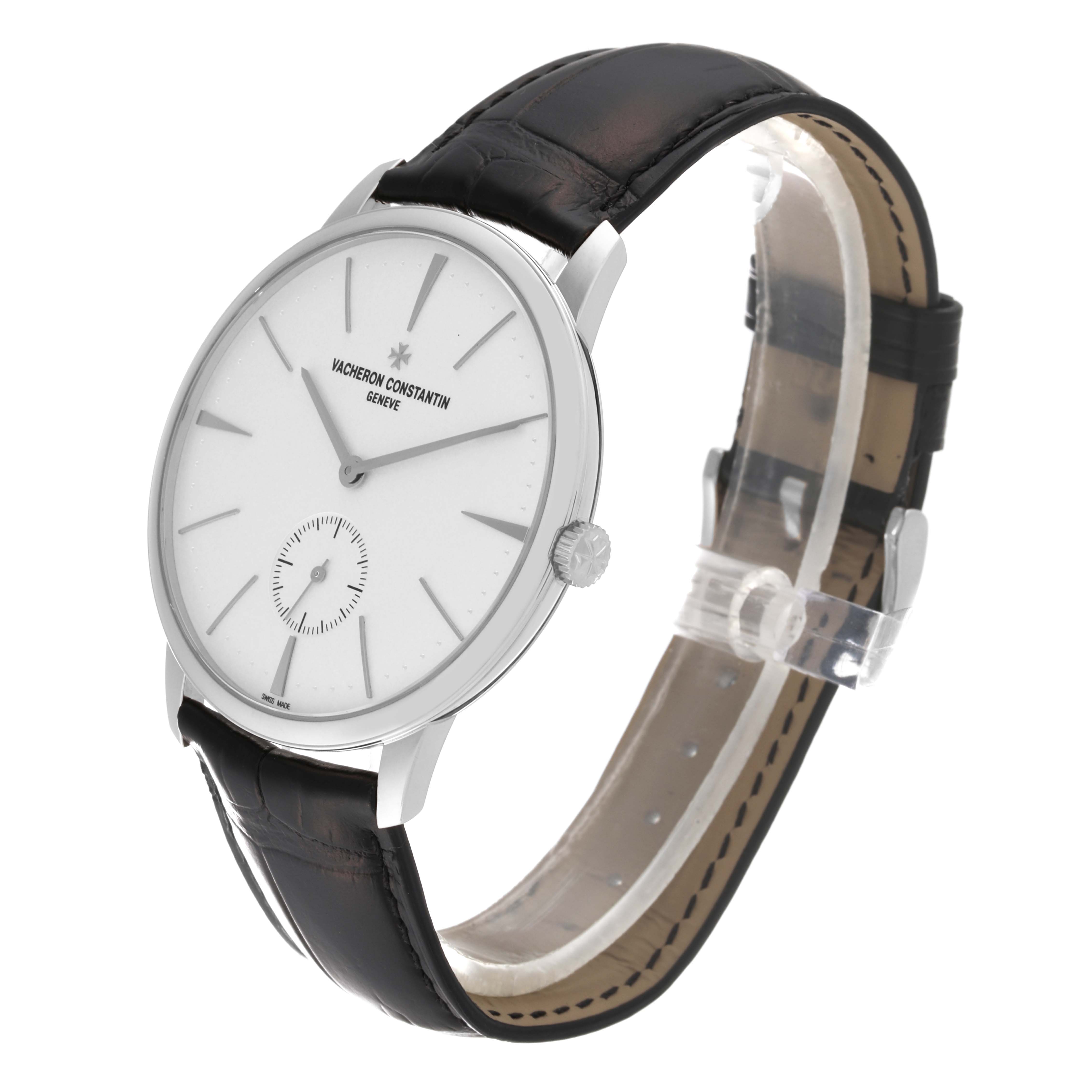The Vacheron Constantin Patrimony 1110U/000G-B086 Men's White Gold Silver Dial 1110U/000G-B086 Men's White Gold Silver Dial watch is shown at a 3/4 angle, displaying the dial, crown, and leather strap.