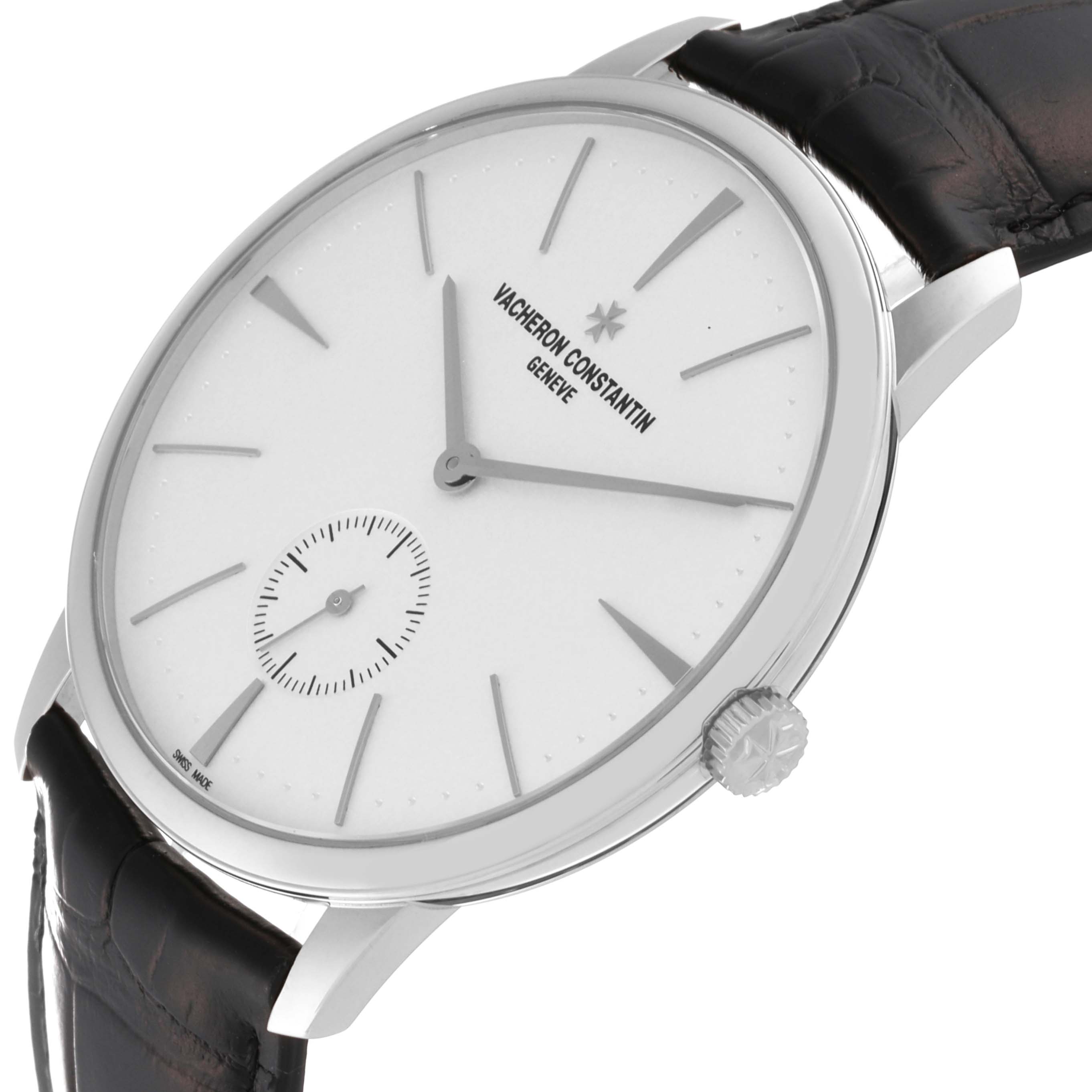 The Vacheron Constantin Patrimony 1110U/000G-B086 Men's White Gold Silver Dial 1110U/000G-B086 Men's White Gold Silver Dial watch is shown at an angled view, highlighting the face, crown, and leather strap.